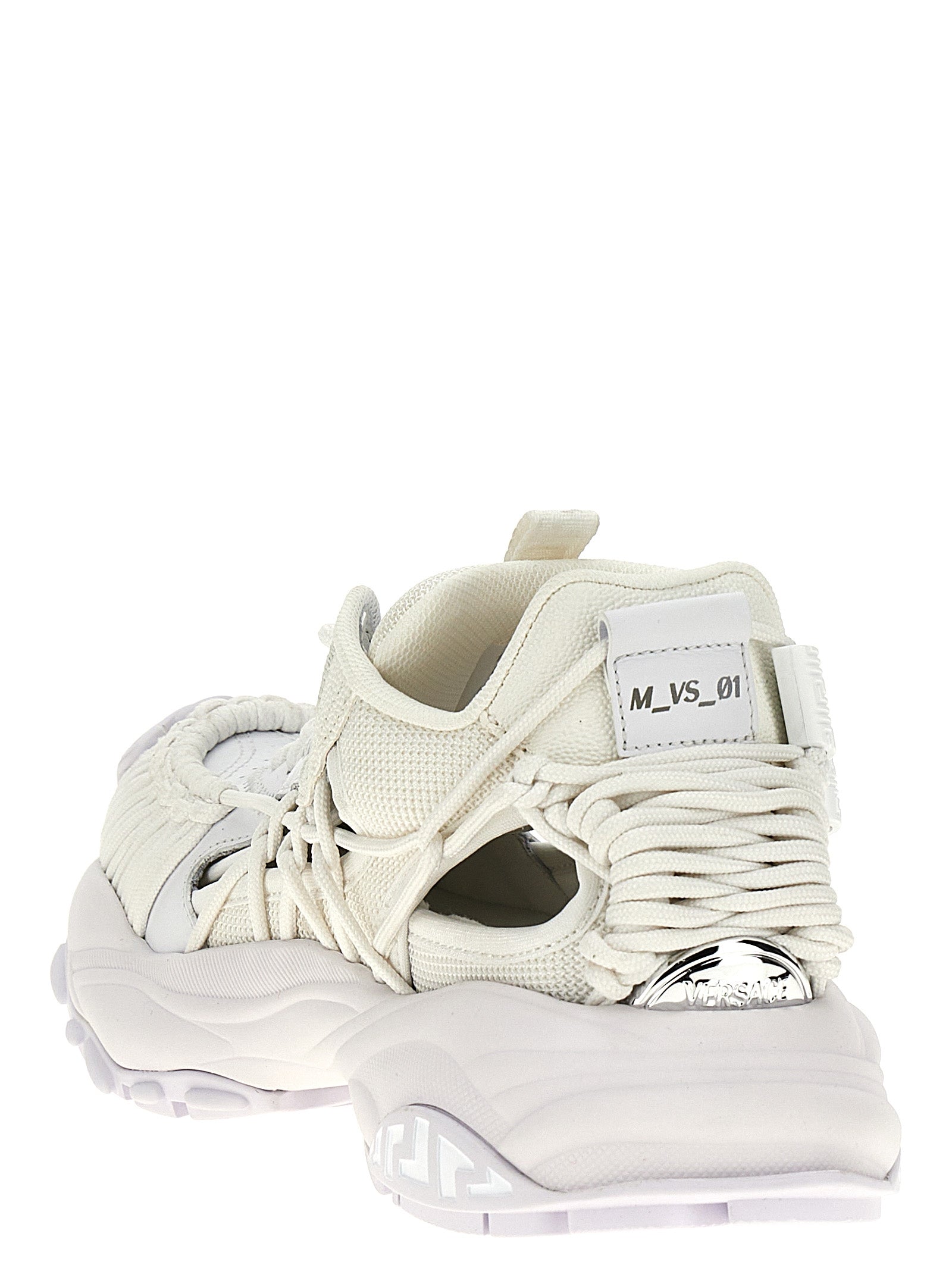 Elevate your style with Versace's White Calfskin Athletic Sneakers, a harmonious blend of luxury and contemporary design, crafted for the discerning individual.