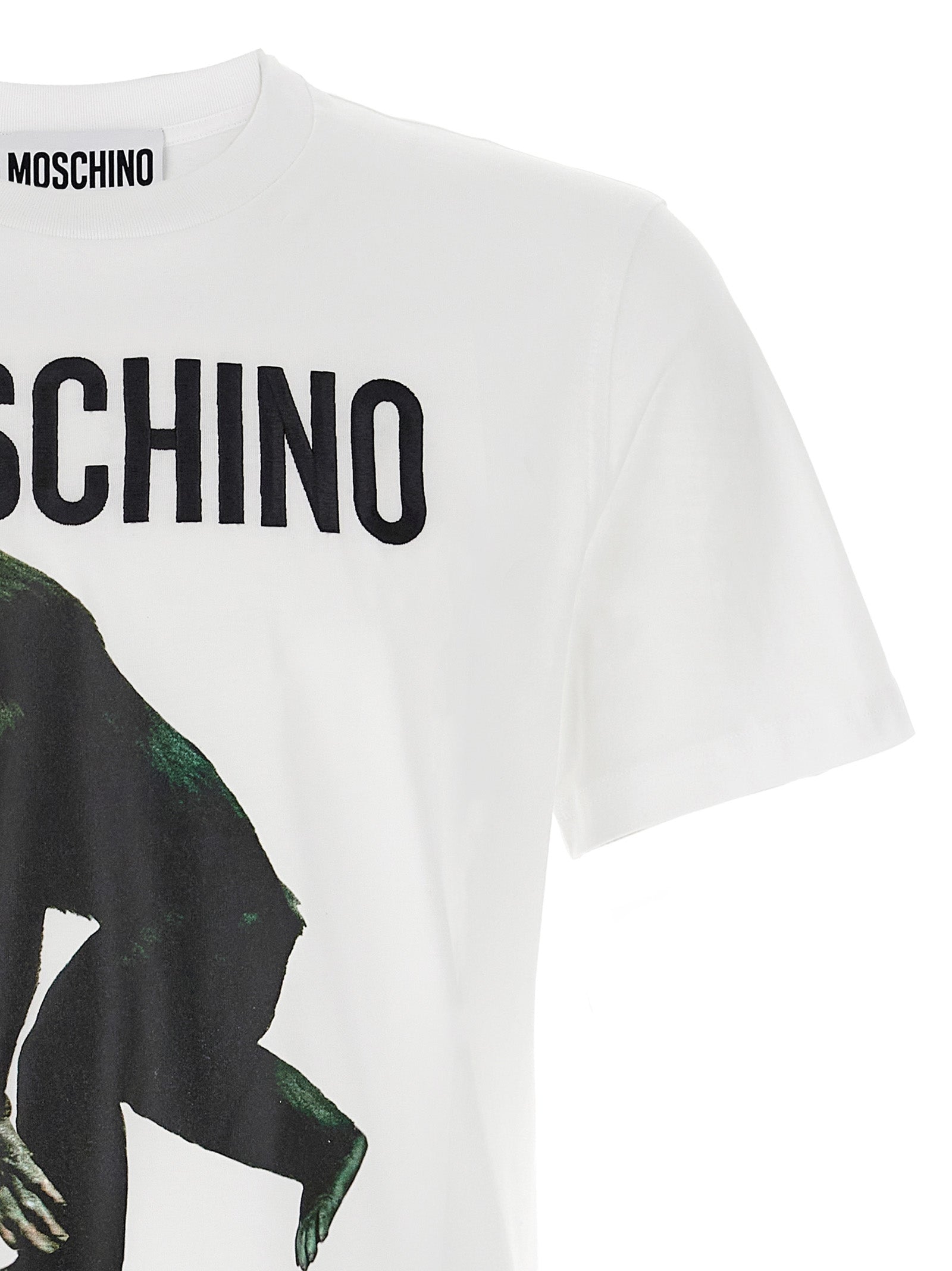 Discover the Moschino White Cotton T-Shirt, a luxurious blend of organic cotton and exquisite craftsmanship, perfect for those who embody elegance and individuality.