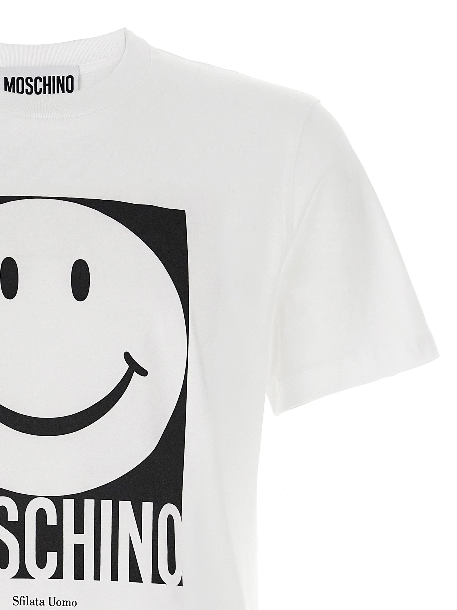 Elevate your wardrobe with the Moschino White Cotton T-Shirt, a luxurious blend of organic cotton and bold artistry, perfect for the discerning individual.