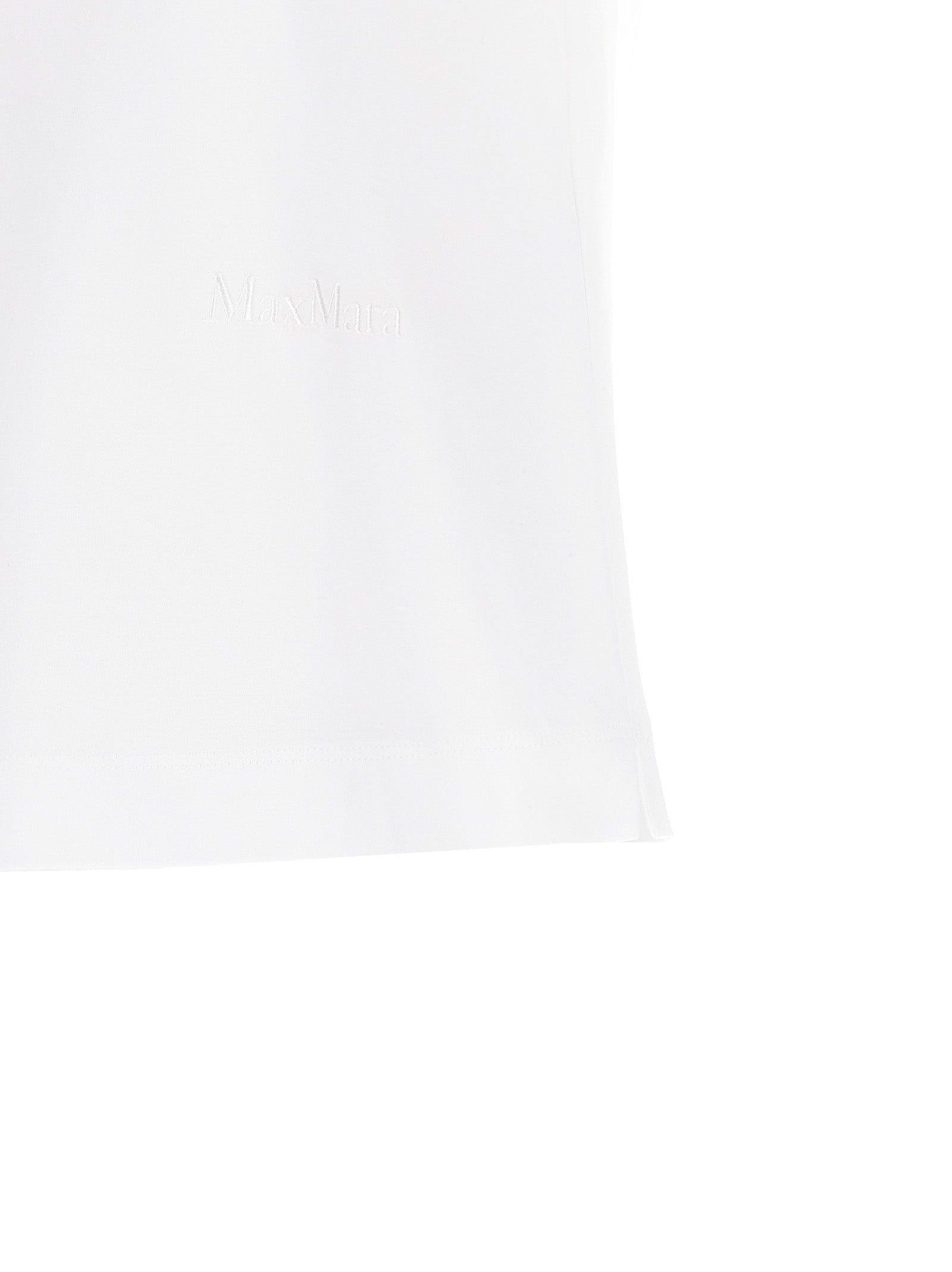 Elevate your style with the Max Mara Nerina T-shirt, a luxurious cotton staple featuring refined embroidery, embodying timeless elegance and sophistication for every occasion.