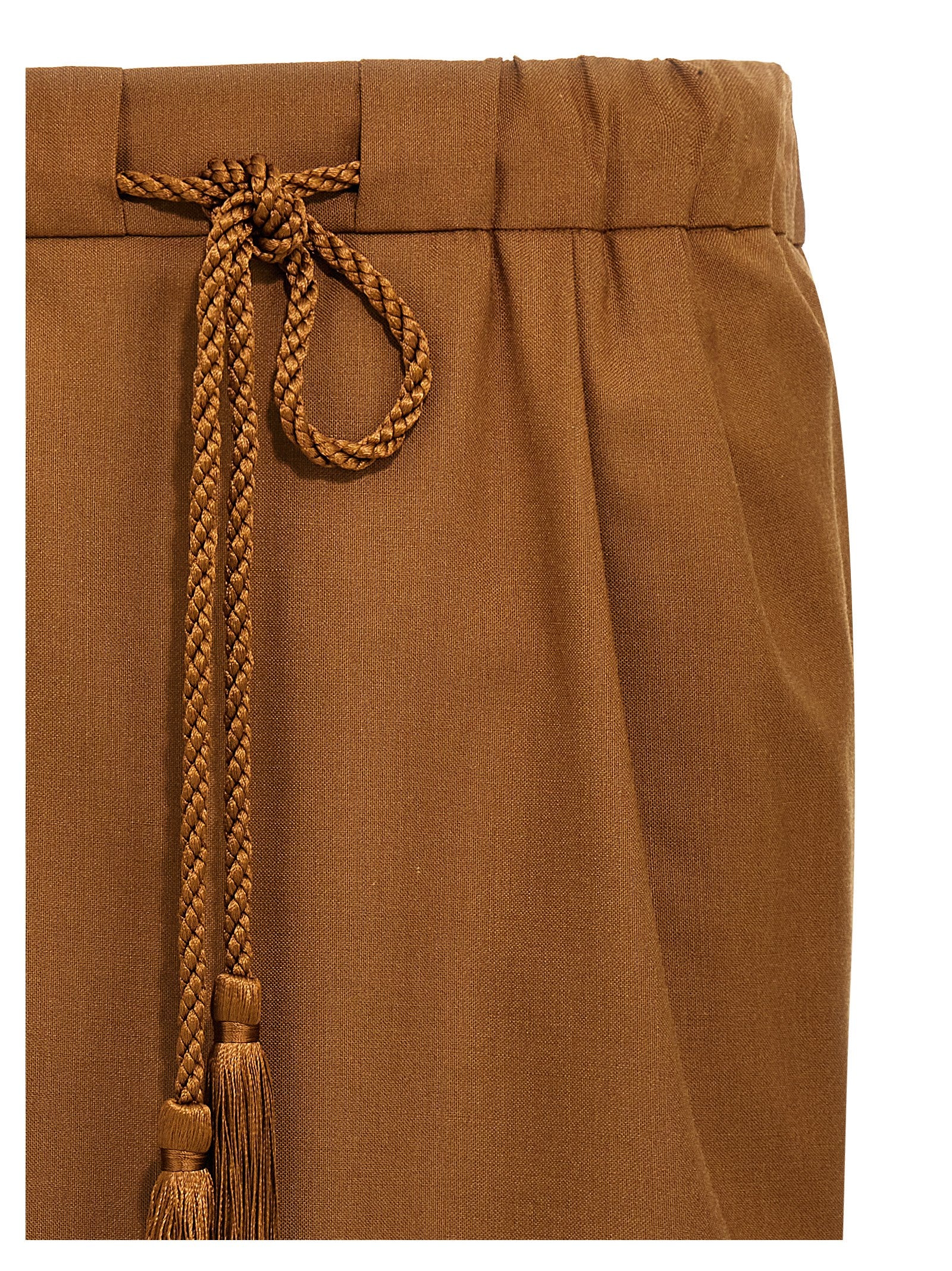 Elevate your style with the Max Mara Brown Virgin Wool Long Skirt, a luxurious blend of virgin wool, mohair, and silk, embodying artisanal elegance and timeless sophistication.