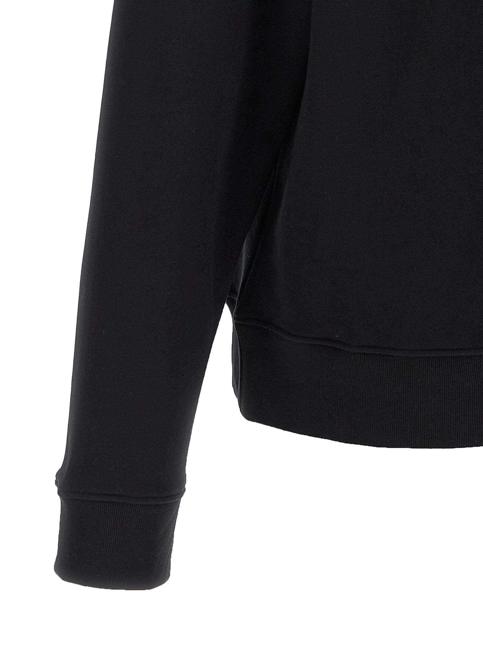 Elevate your style with the Moschino Black Cotton Sweatshirt, a luxurious blend of playful design and exquisite craftsmanship, perfect for the discerning individual.