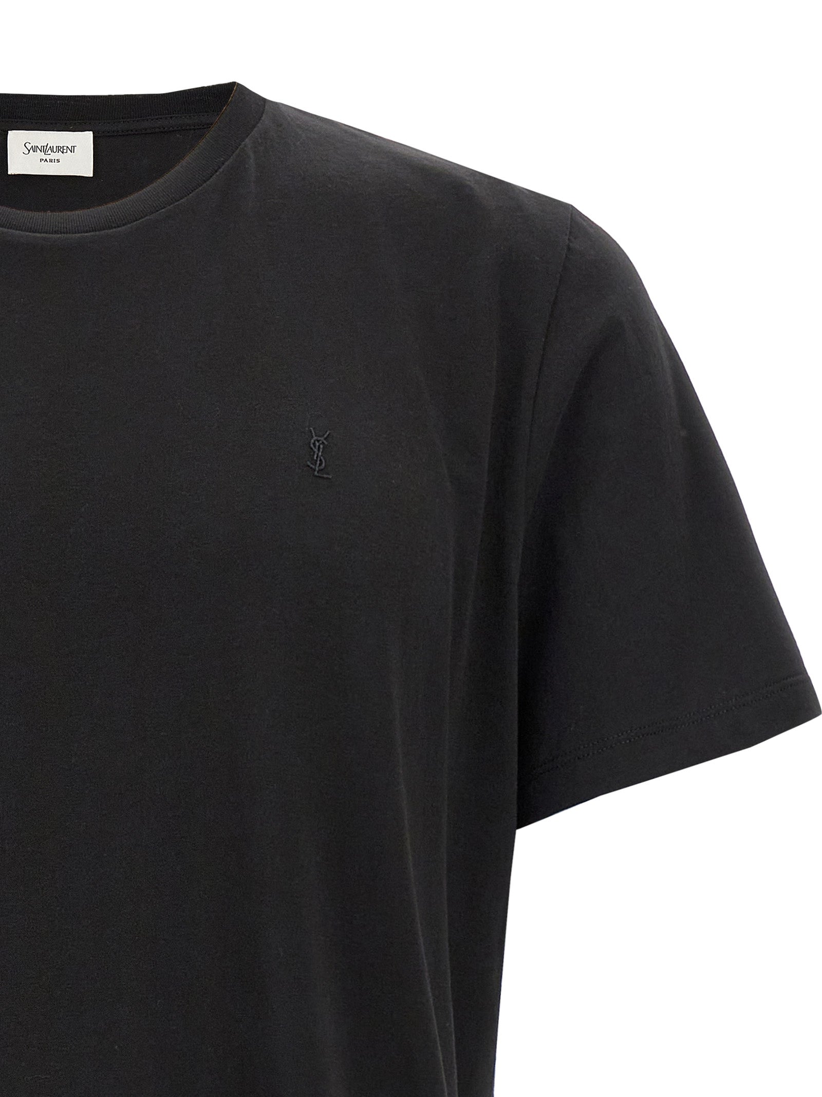 Indulge in the Saint Laurent Black Cotton T-Shirt, a timeless blend of artisanal luxury and sophistication, featuring exquisite Cassandre embroidery for effortless elegance.