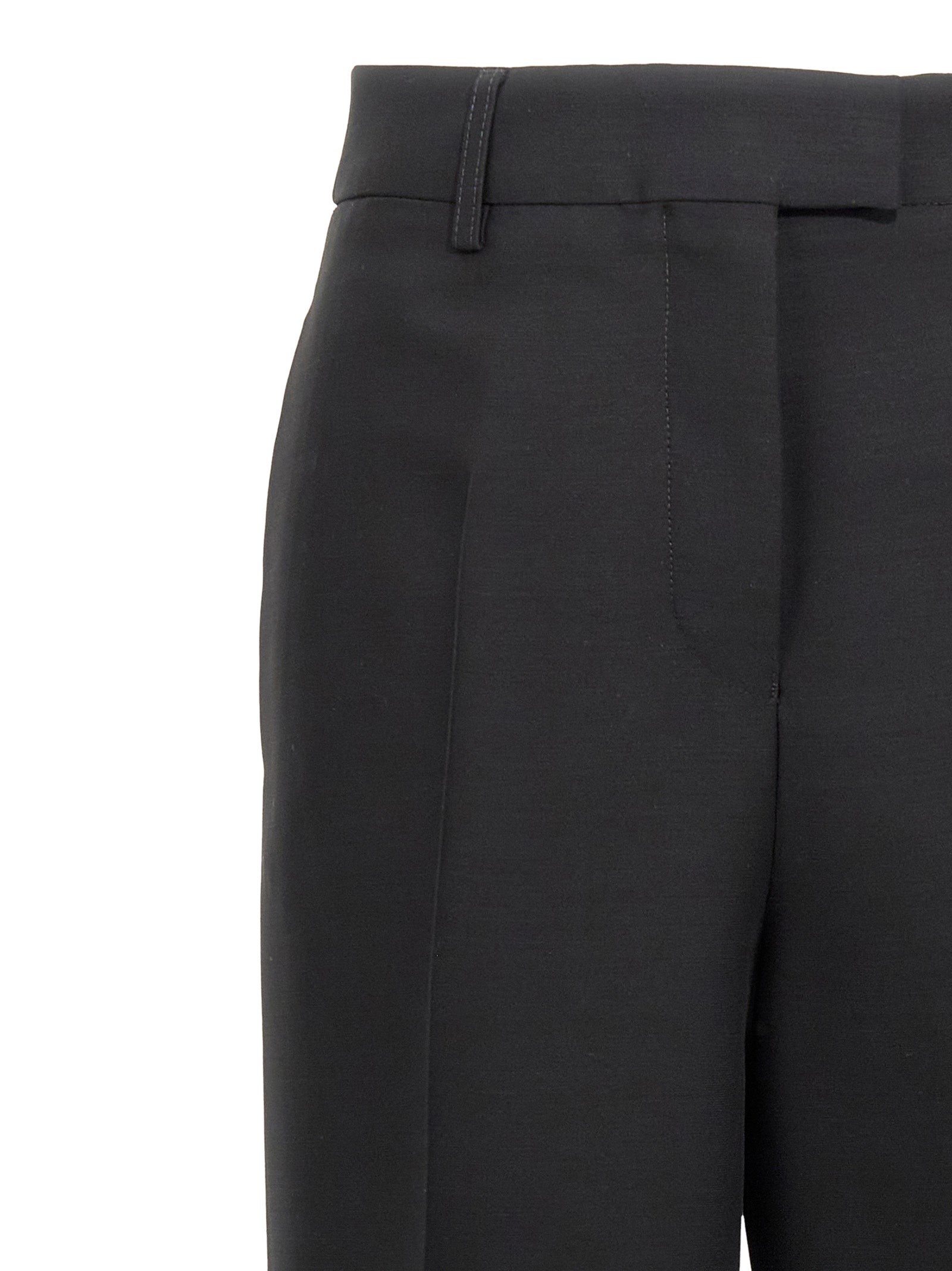 Elevate your wardrobe with Ferragamo Black Viscose Dress Pants, a luxurious blend of viscose and virgin wool, embodying timeless elegance and Italian craftsmanship.