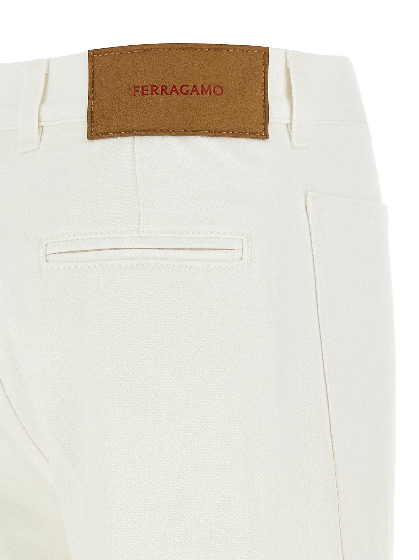 Indulge in the luxurious elegance of Ferragamo's White Cotton Straight-Leg Jeans, crafted in Italy for those who appreciate exquisite craftsmanship and timeless style.