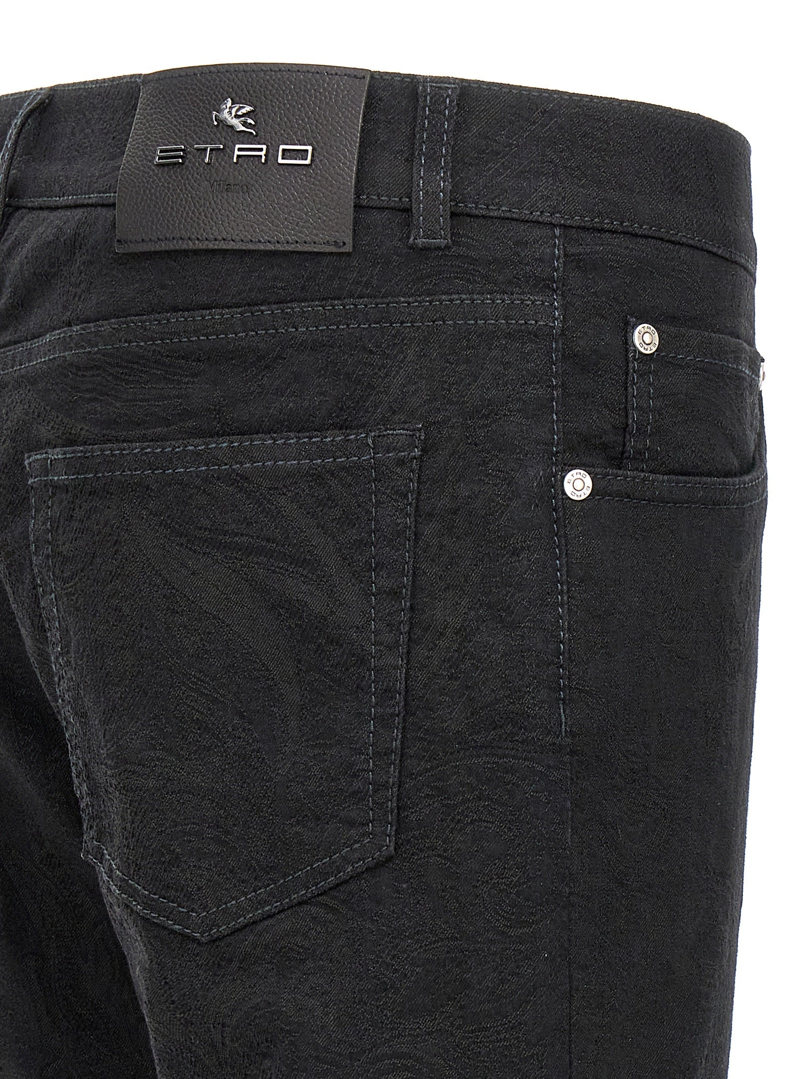 Indulge in Etro's black cotton jeans, a luxurious blend of craftsmanship and style, featuring sophisticated jacquard detailing for timeless elegance.