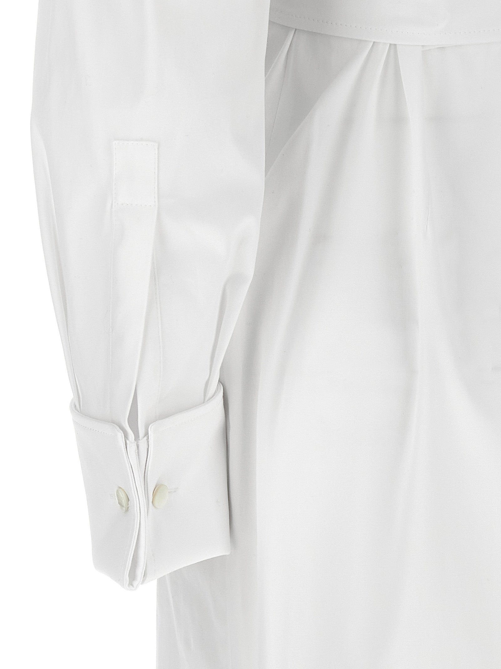 Experience the exquisite artistry of the Max Mara White Cotton Long Dress, a luxurious blend of comfort and elegance, perfect for discerning tastes.