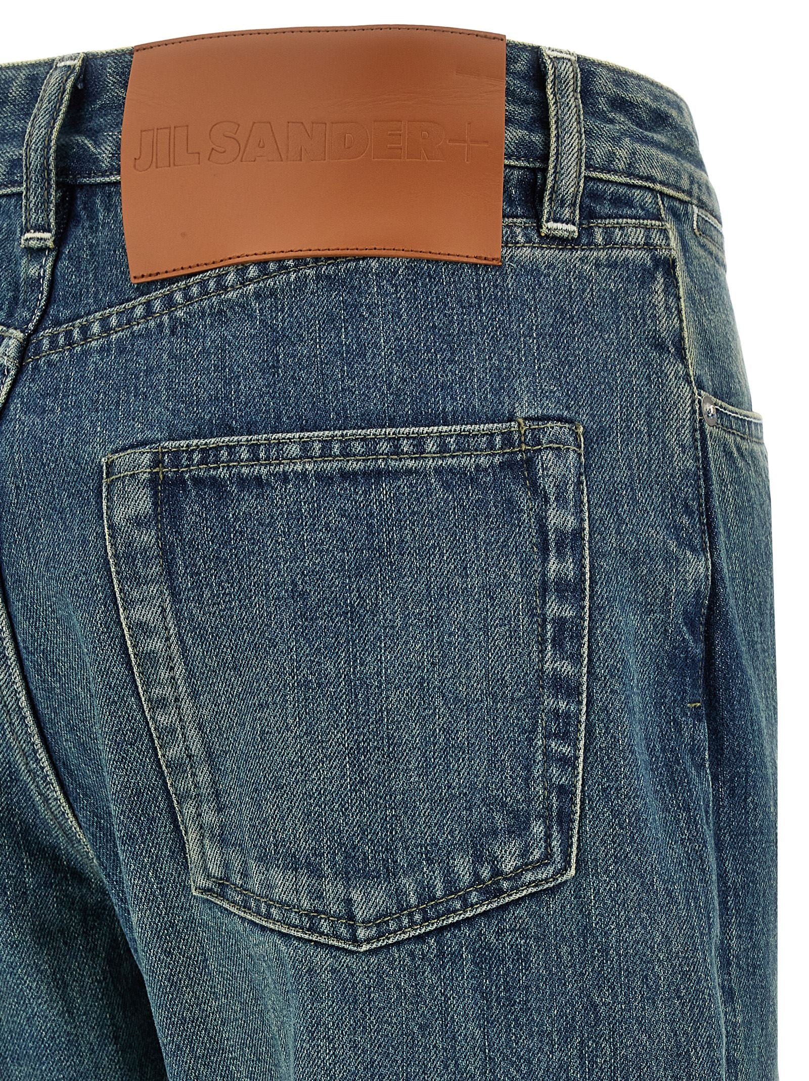 Elevate your style with Jil Sander's Blue Cotton Slim Fit Jeans, where artisanal craftsmanship meets timeless elegance, perfect for the discerning individual.