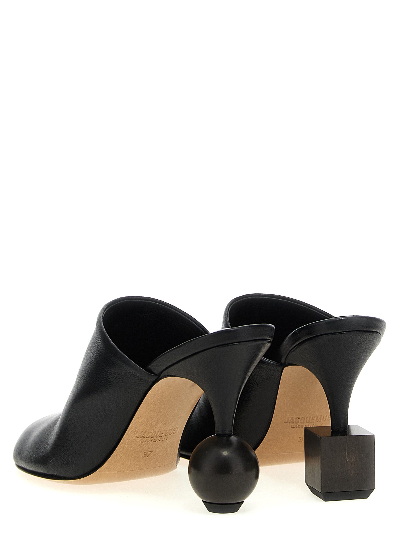 Step into the realm of luxury with Jacquemus Black Lamb Leather High Heel Pumps, where exquisite craftsmanship meets avant-garde design for a statement of elegance.