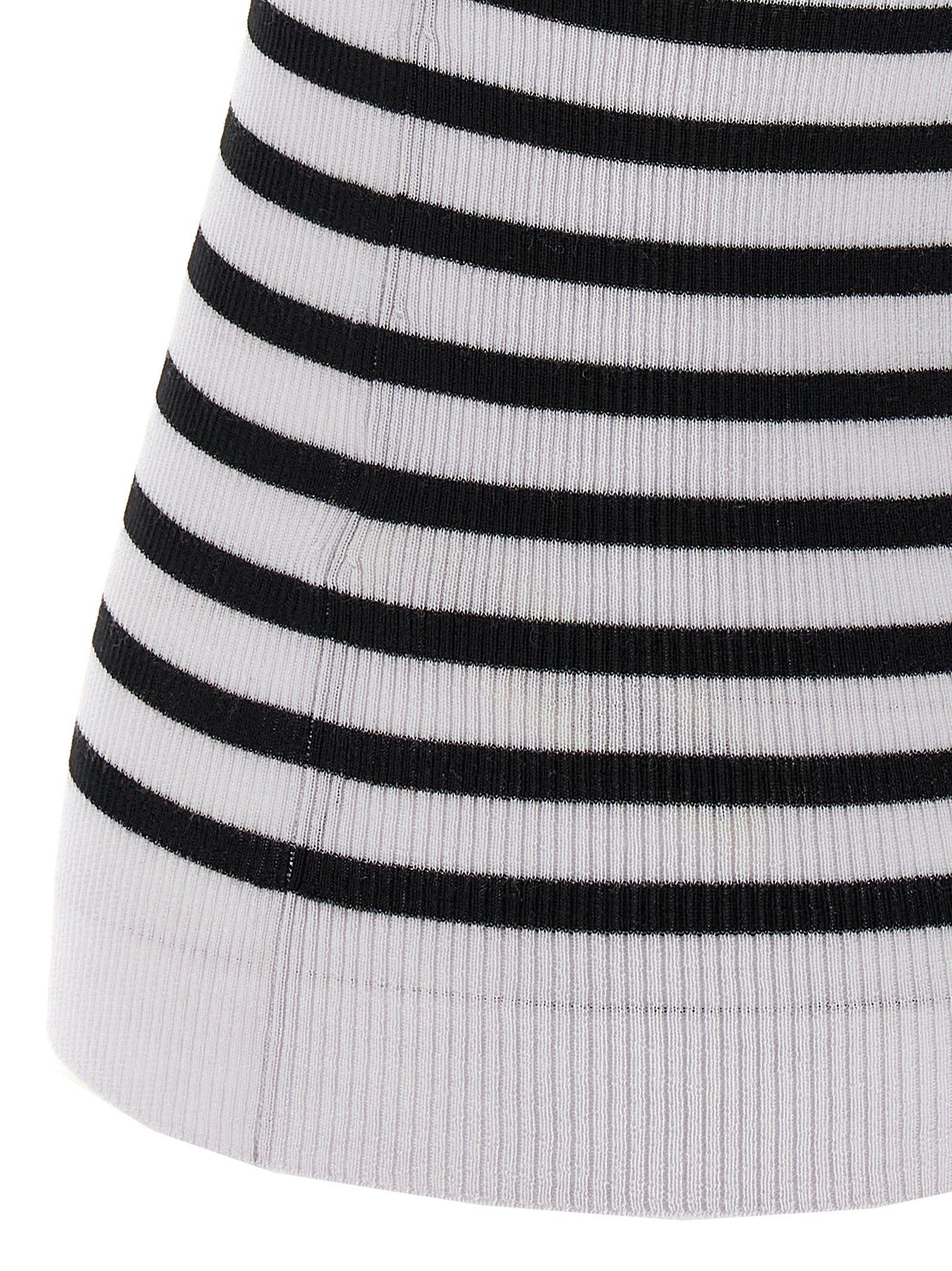 Experience the allure of Khaite's Bicolor Wool Sleeveless T-Shirt, crafted from luxurious Merino wool, embodying sophistication and timeless elegance for discerning tastes.