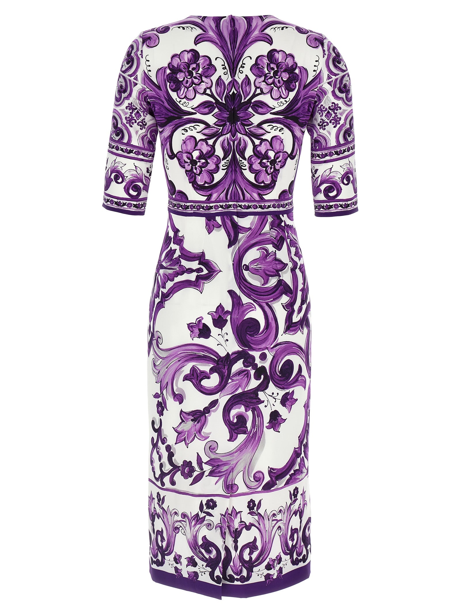 Indulge in the artistry of the Dolce & Gabbana Purple Silk Midi Dress, a unique masterpiece crafted from luxurious silk, perfect for elevating your sophisticated wardrobe.