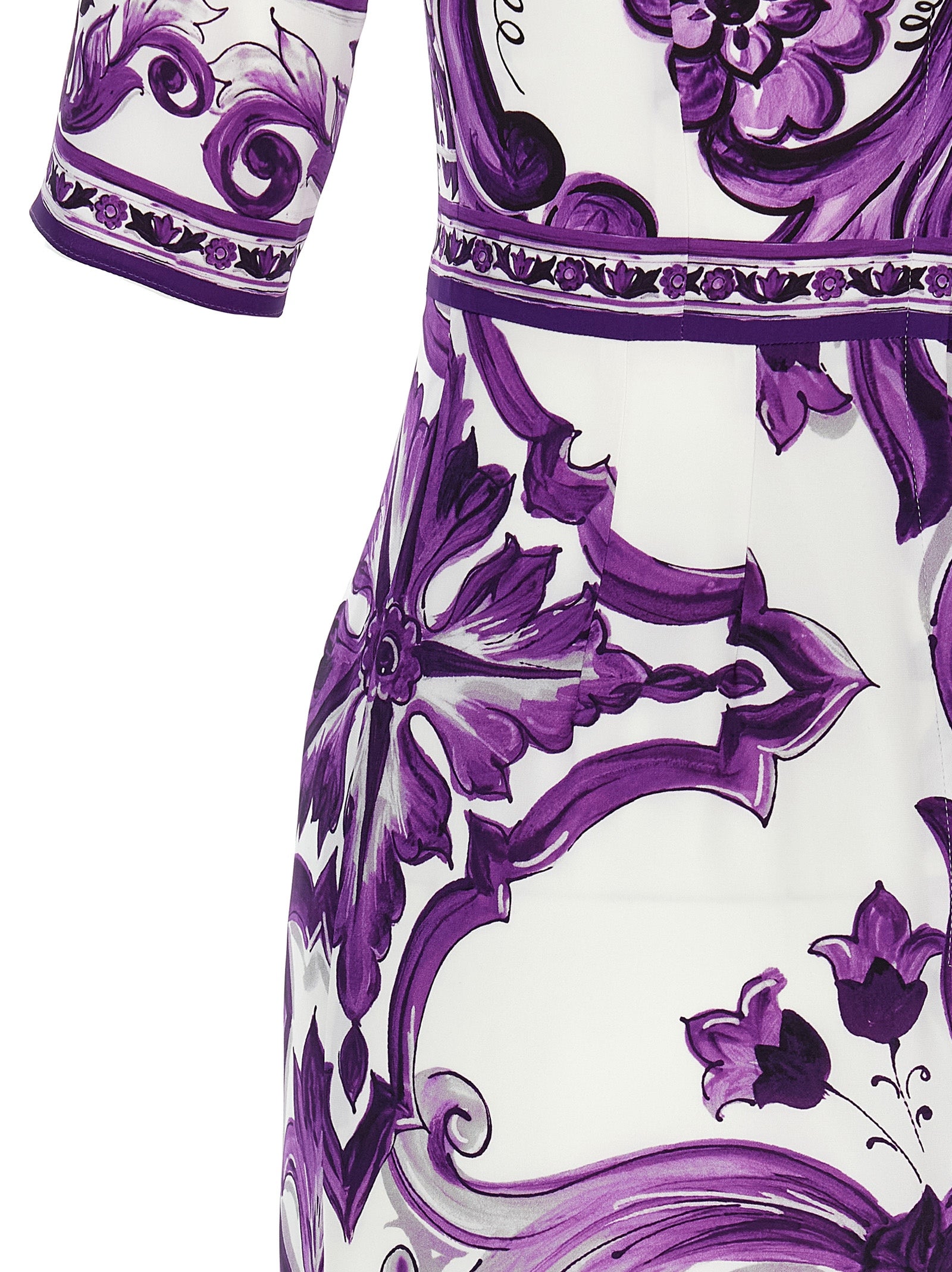 Experience the artistry of Dolce & Gabbana with this Purple Silk Midi Dress, a unique masterpiece that embodies luxury, elegance, and timeless allure.