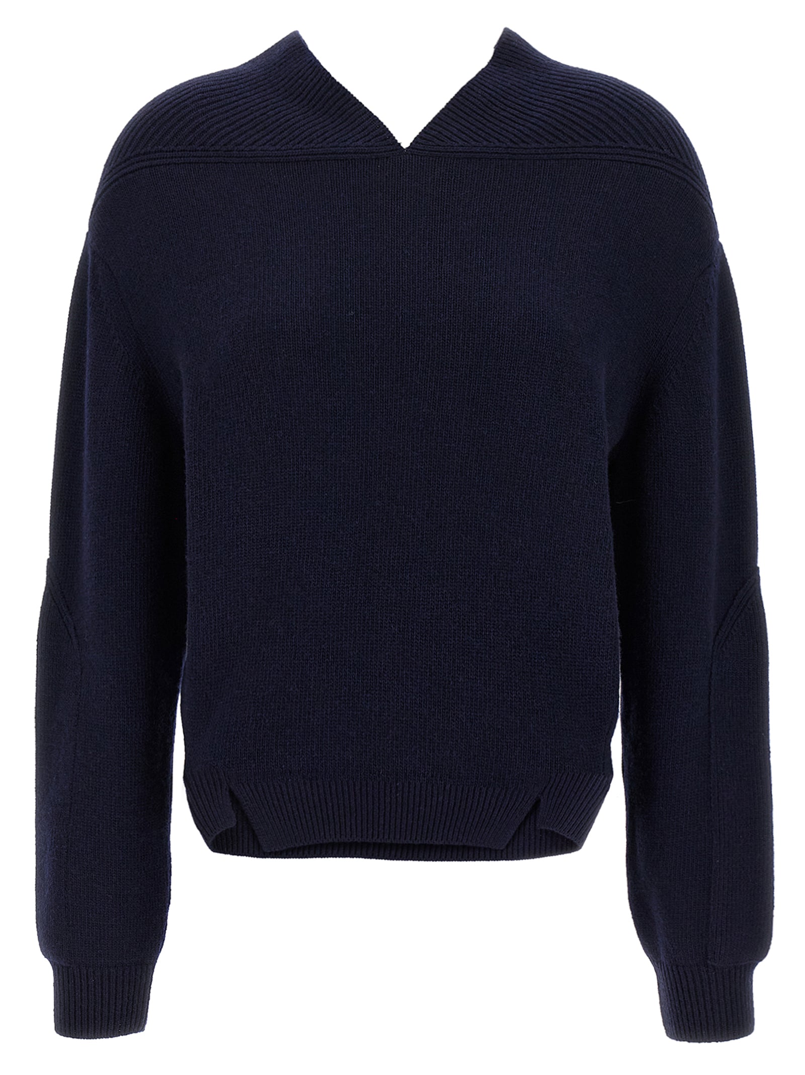 Elevate your style with the Victoria Beckham Blue Wool Cardigan, a luxurious blend of wool and cashmere, embodying timeless elegance and sophisticated allure.