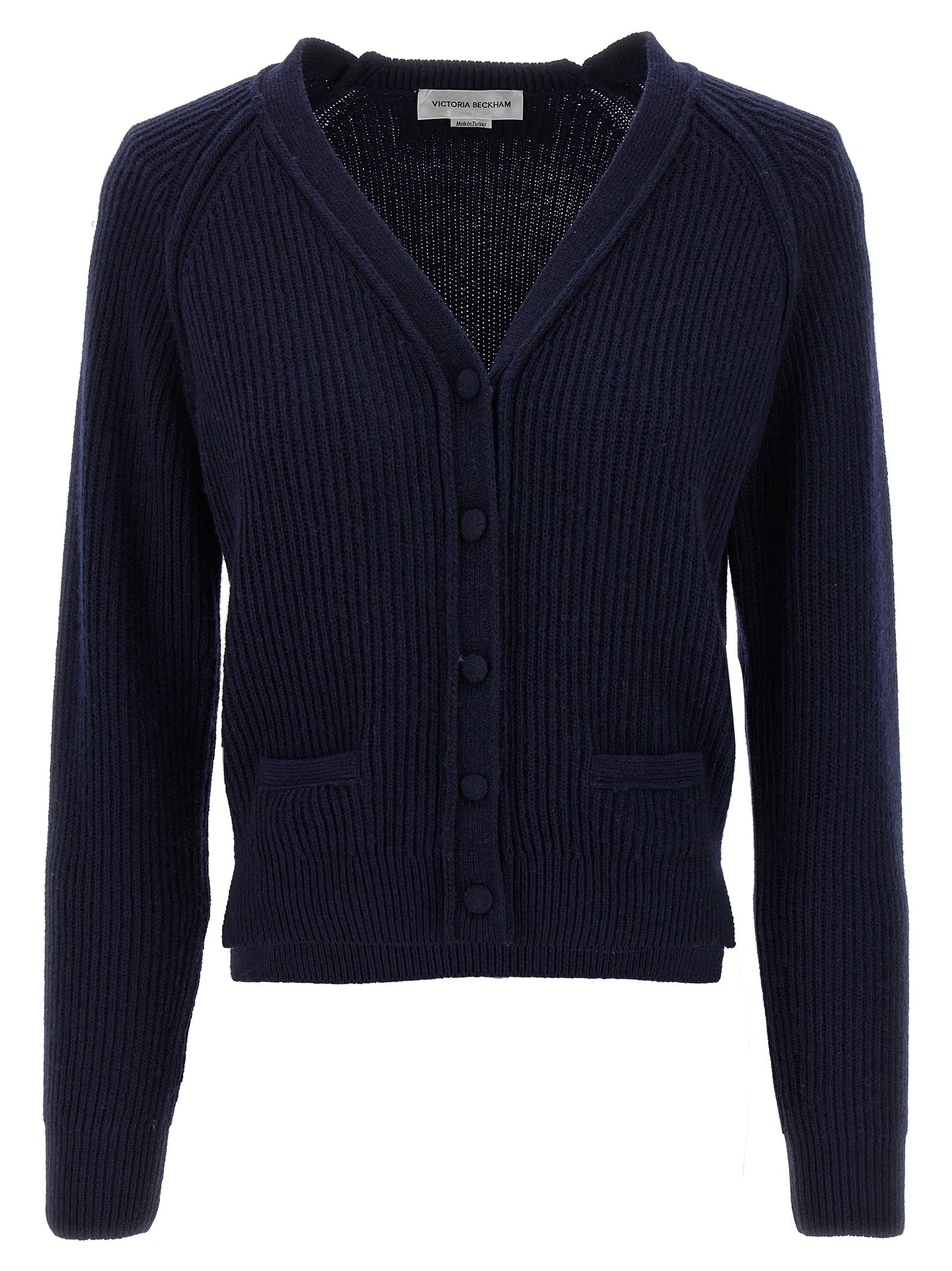 Experience the allure of the Victoria Beckham Blue Wool Cardigan, a luxurious cashmere blend piece that embodies sophistication and timeless elegance for the discerning fashionista.