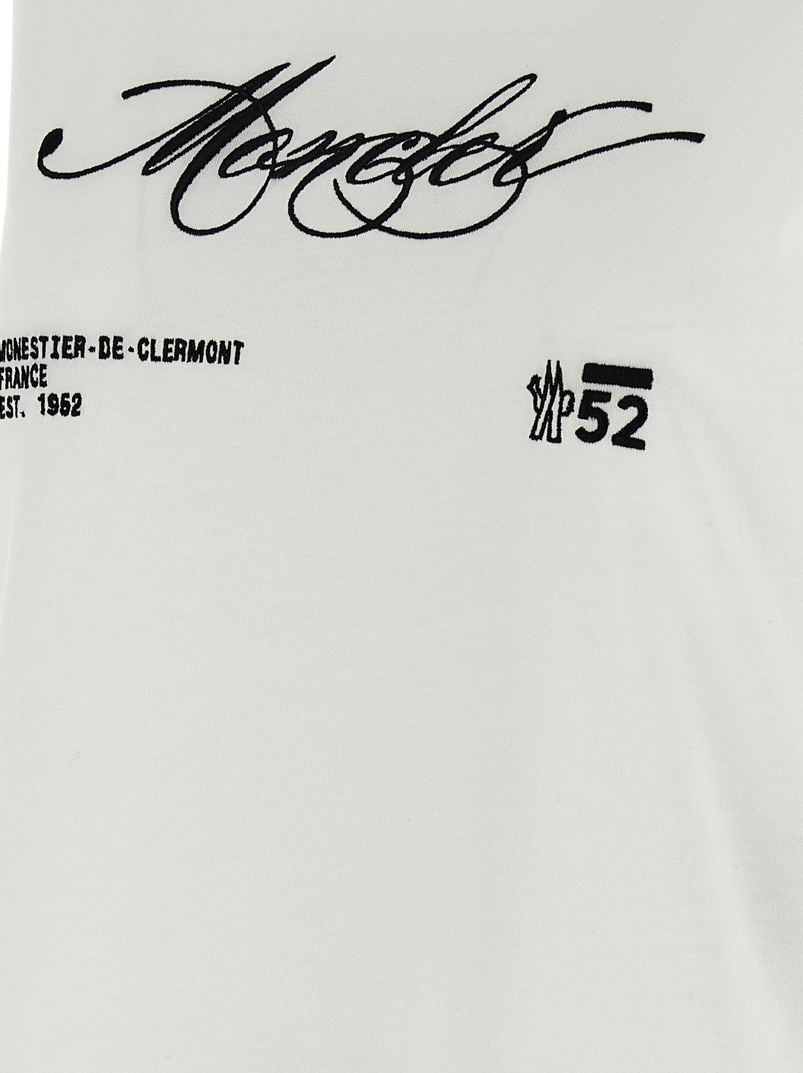 Elevate your wardrobe with the Moncler White Cotton Sportswear T-shirt, a luxurious blend of comfort and elegance, perfect for timeless sophistication and effortless style.