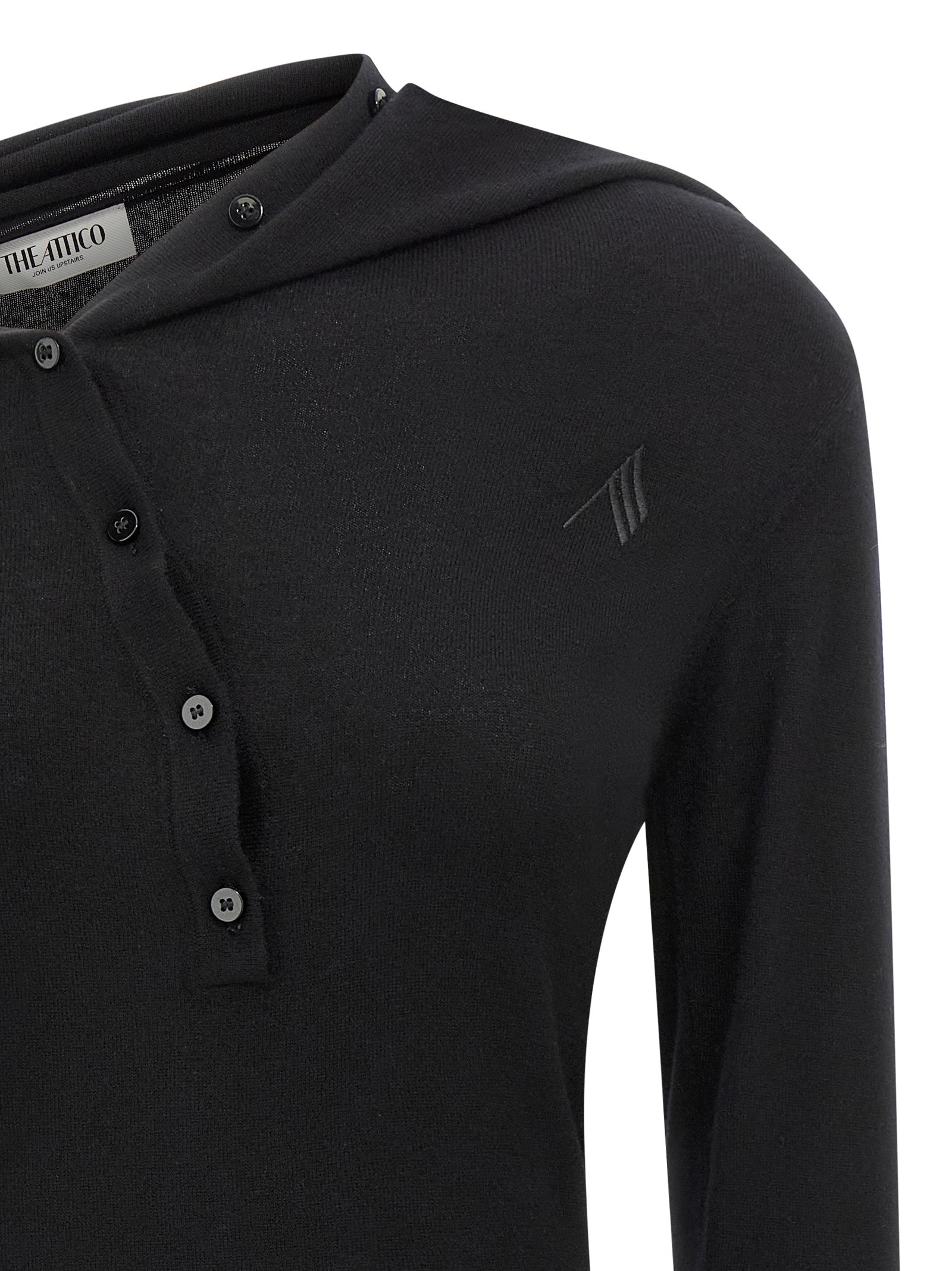 Indulge in The Attico Black Virgin Wool Short Dress, a masterpiece of Italian craftsmanship, blending luxurious warmth and sophisticated design for the discerning connoisseur.