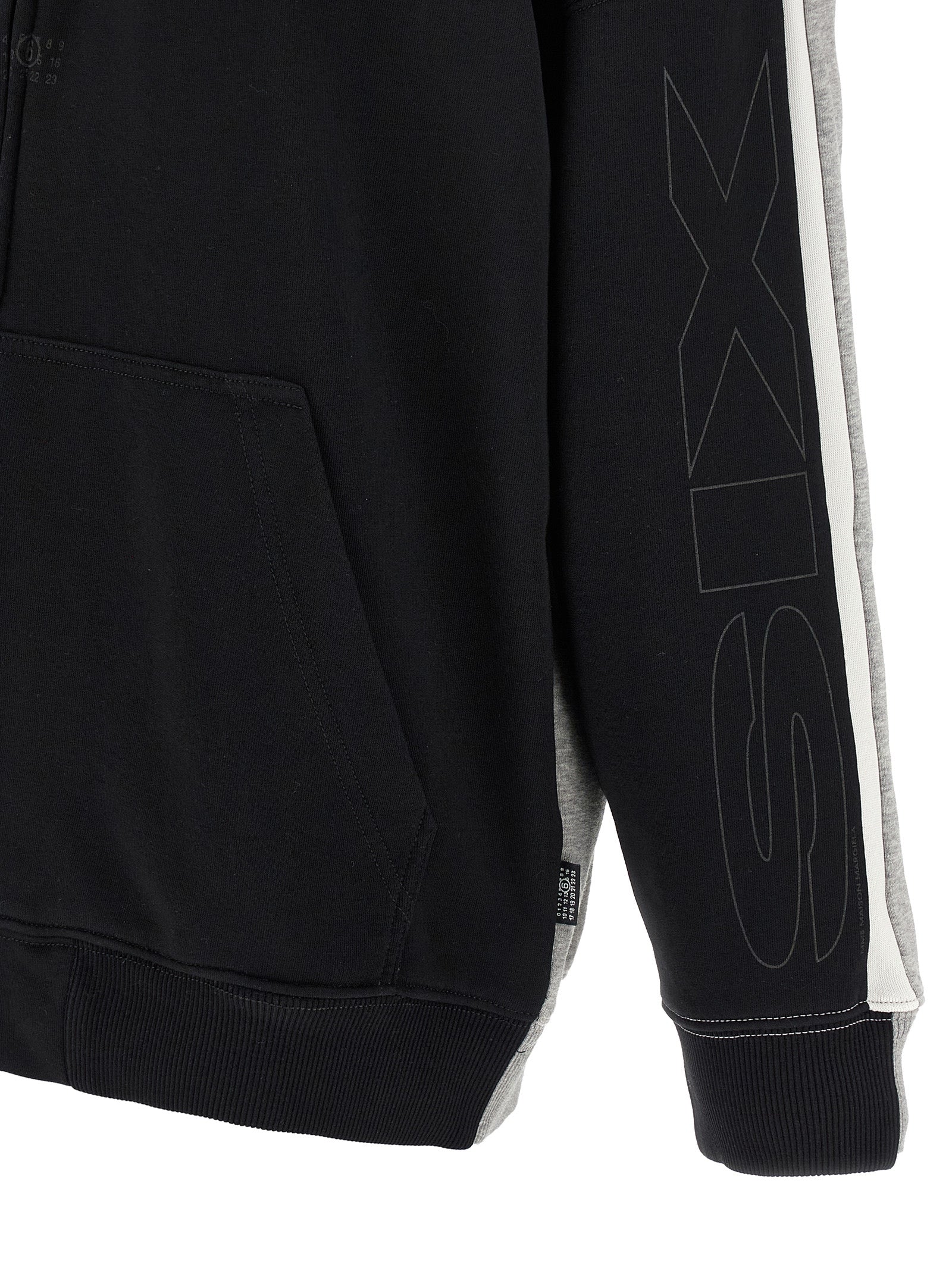 Elevate your style with the MM6 Maison Margiela Multicolor Cotton Sweatshirt, a masterpiece of avant-garde design and luxurious comfort, crafted in Italy for the discerning individual.