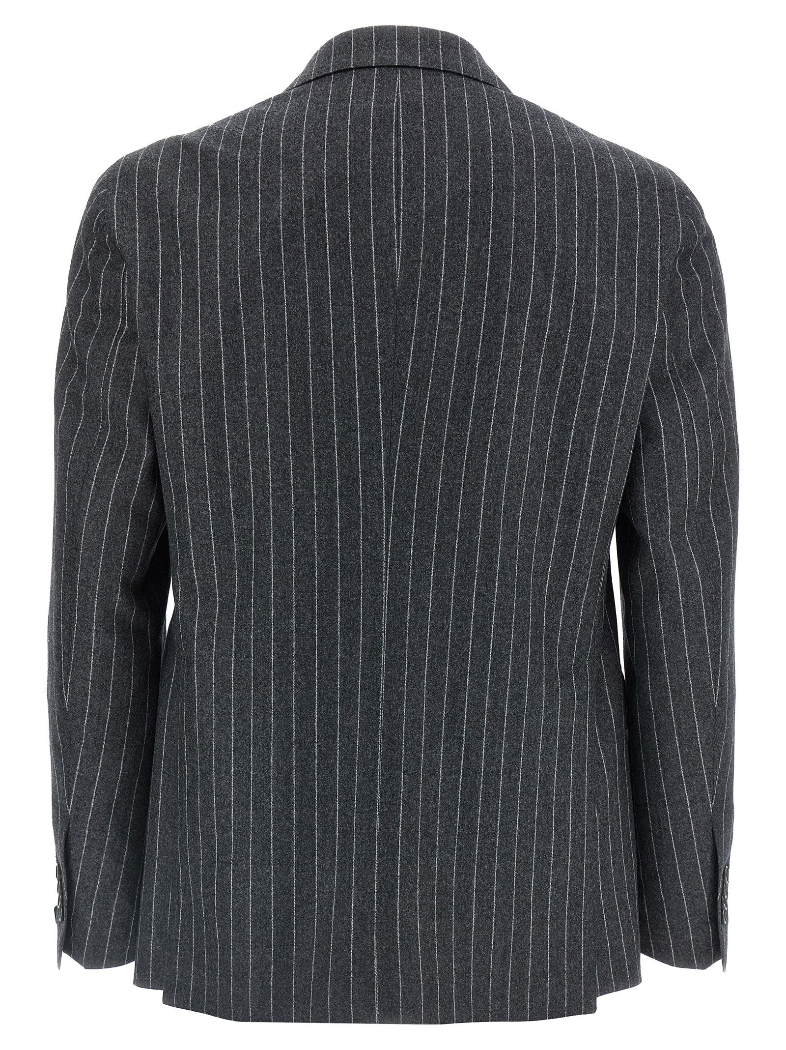 Discover the Tagliatore Gray Virgin Wool Two-Piece Suit, a masterpiece of Italian craftsmanship that exudes timeless elegance and sophistication for the discerning individual.