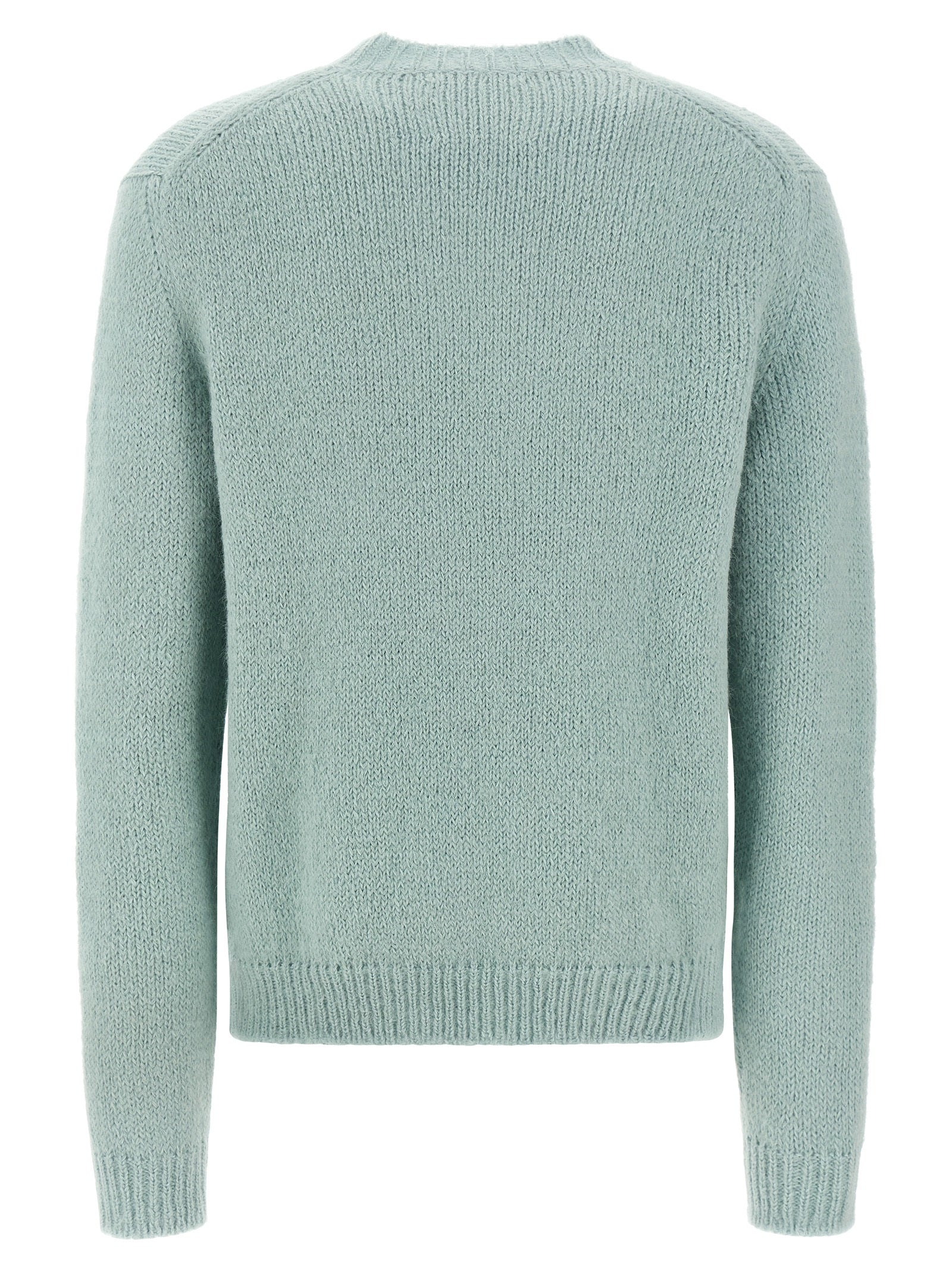 Indulge in the Jil Sander Blue Alpaca Leather Cardigan, a masterclass in luxury crafted from sumptuous alpaca wool, embodying timeless elegance for the discerning individual.