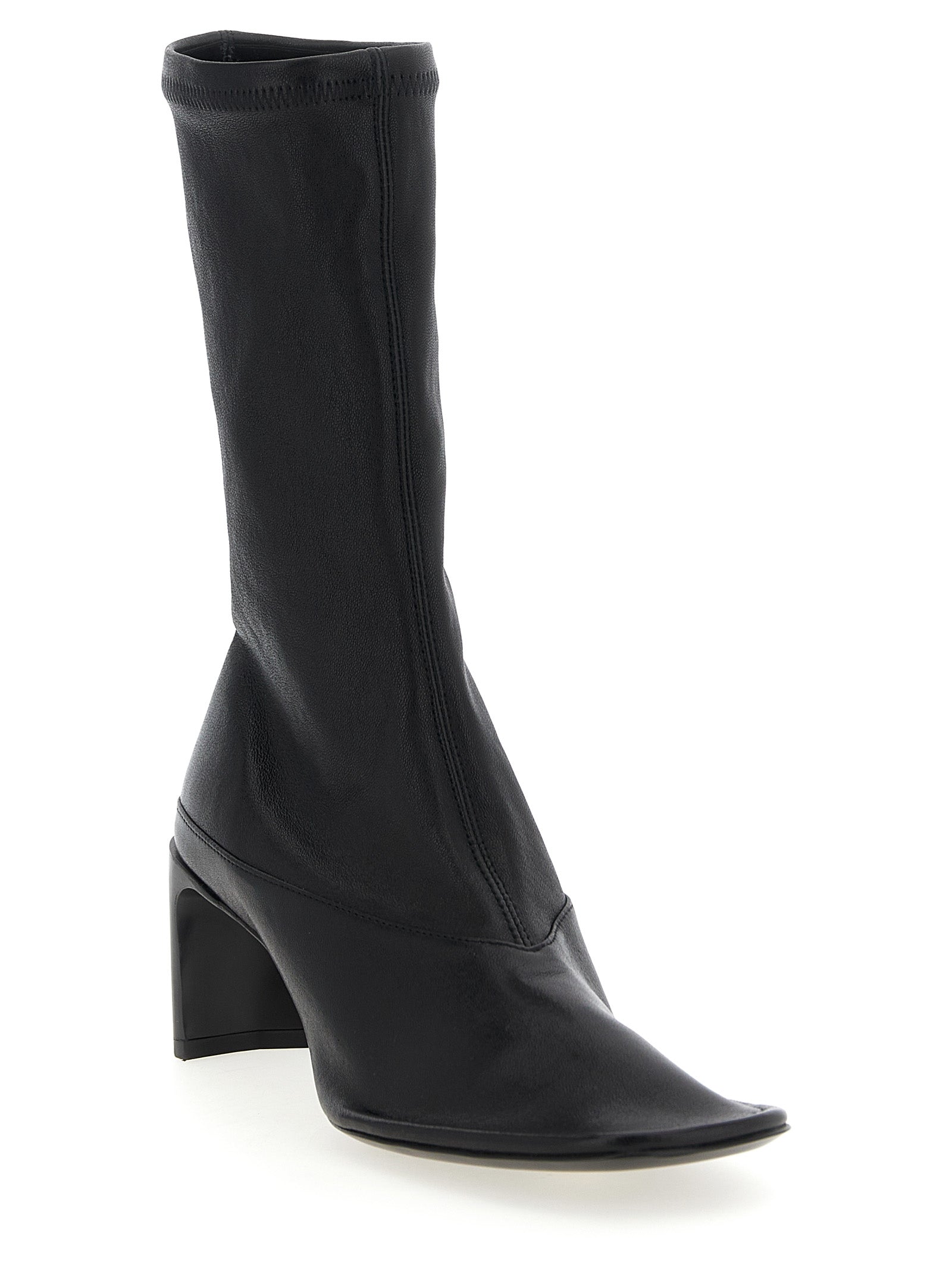 Discover the exquisite Jil Sander Black Lamb Leather Ankle Boots, where artisanal craftsmanship meets modern elegance, elevating your style with unparalleled sophistication.