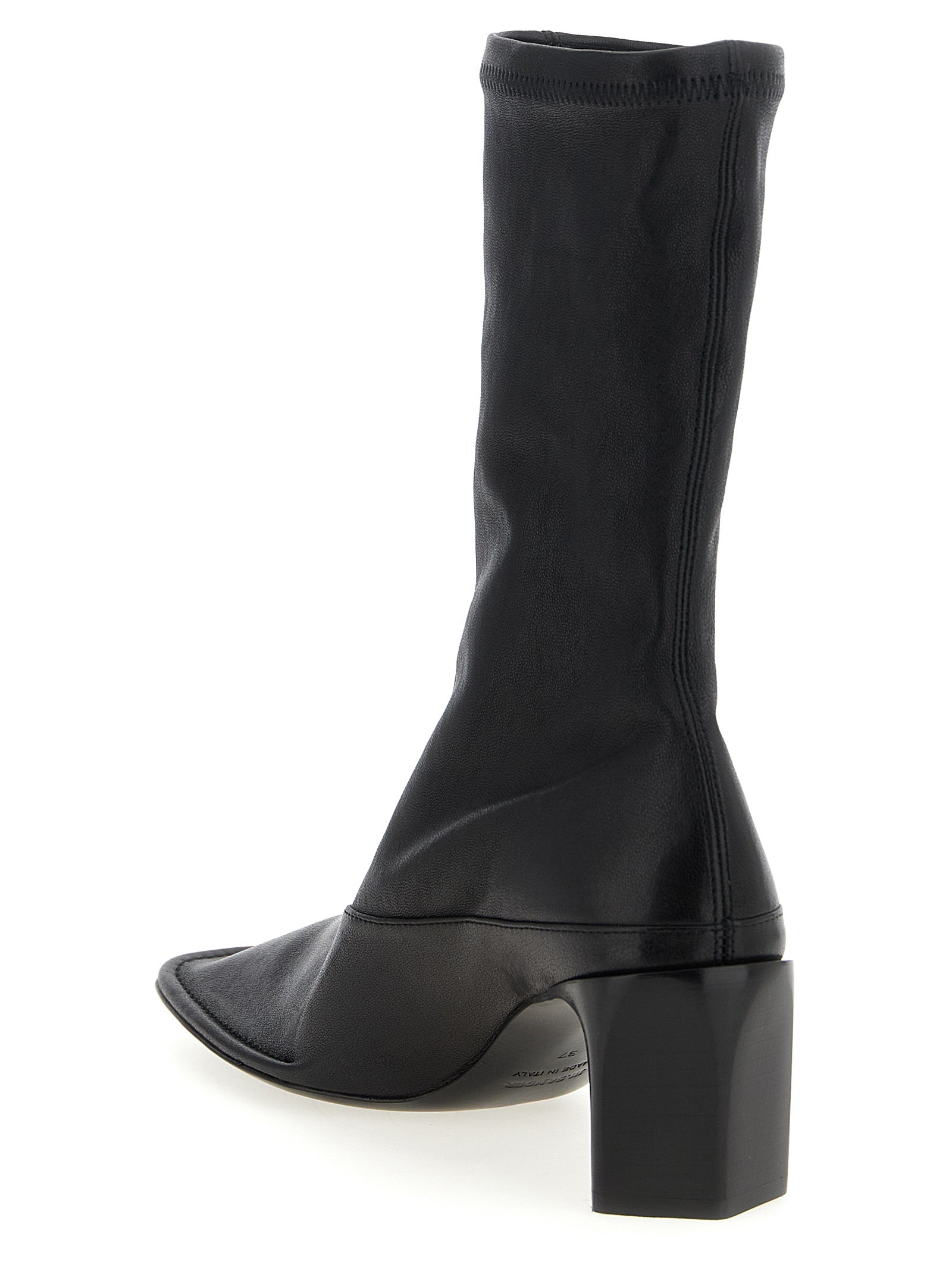 Experience the allure of Jil Sander's Black Lamb Leather Ankle Boots, where exquisite craftsmanship meets modern elegance, perfect for the discerning fashion connoisseur.