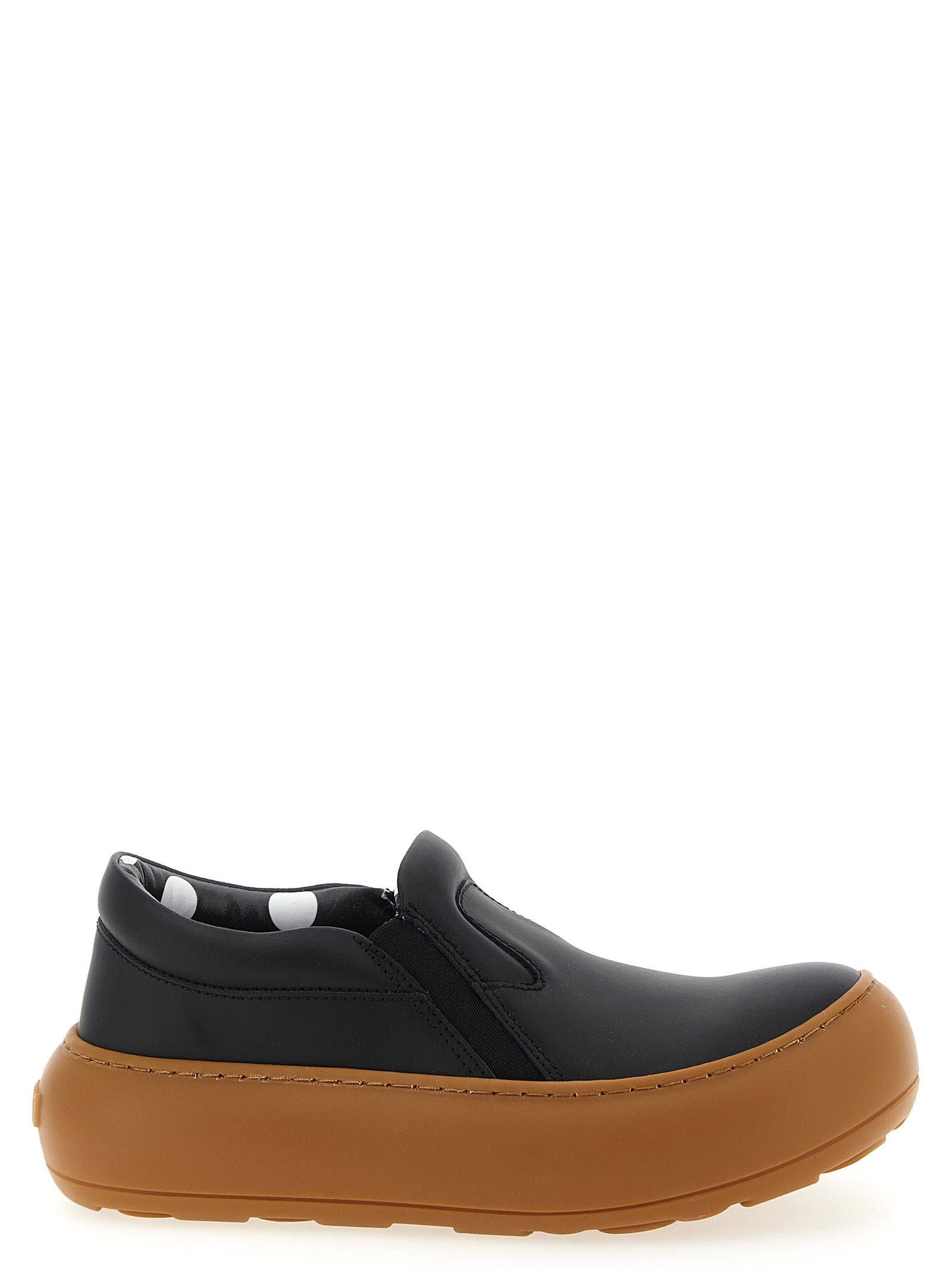 Step into the realm of luxury with Moschino's Black Leather Chunky Sneakers, where artisanal craftsmanship meets playful elegance, perfect for the discerning fashion connoisseur.