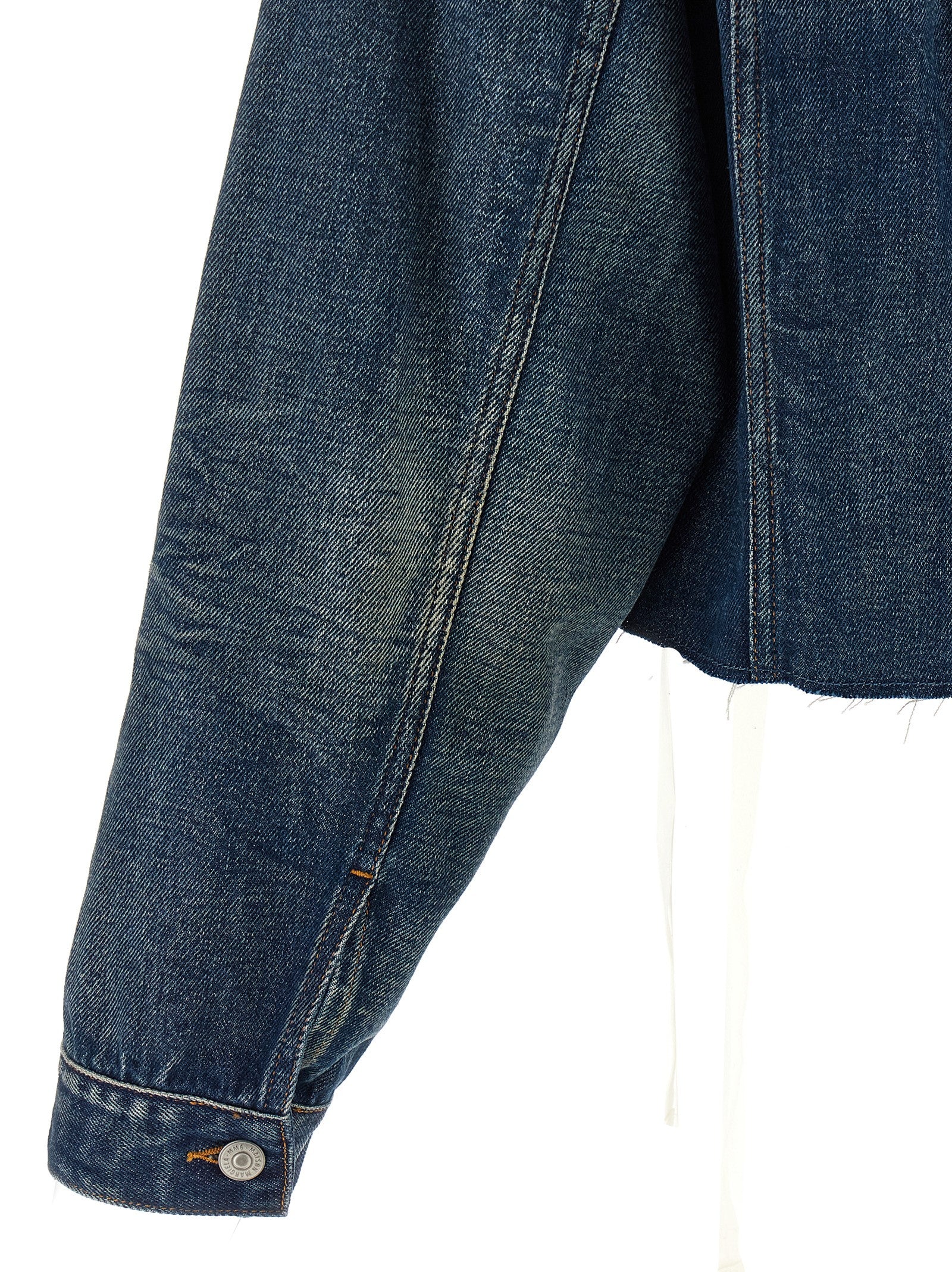 Elevate your style with the MM6 Maison Margiela Blue Cotton Denim Jacket, a masterpiece of avant-garde design, crafted in Italy for the discerning fashion connoisseur.