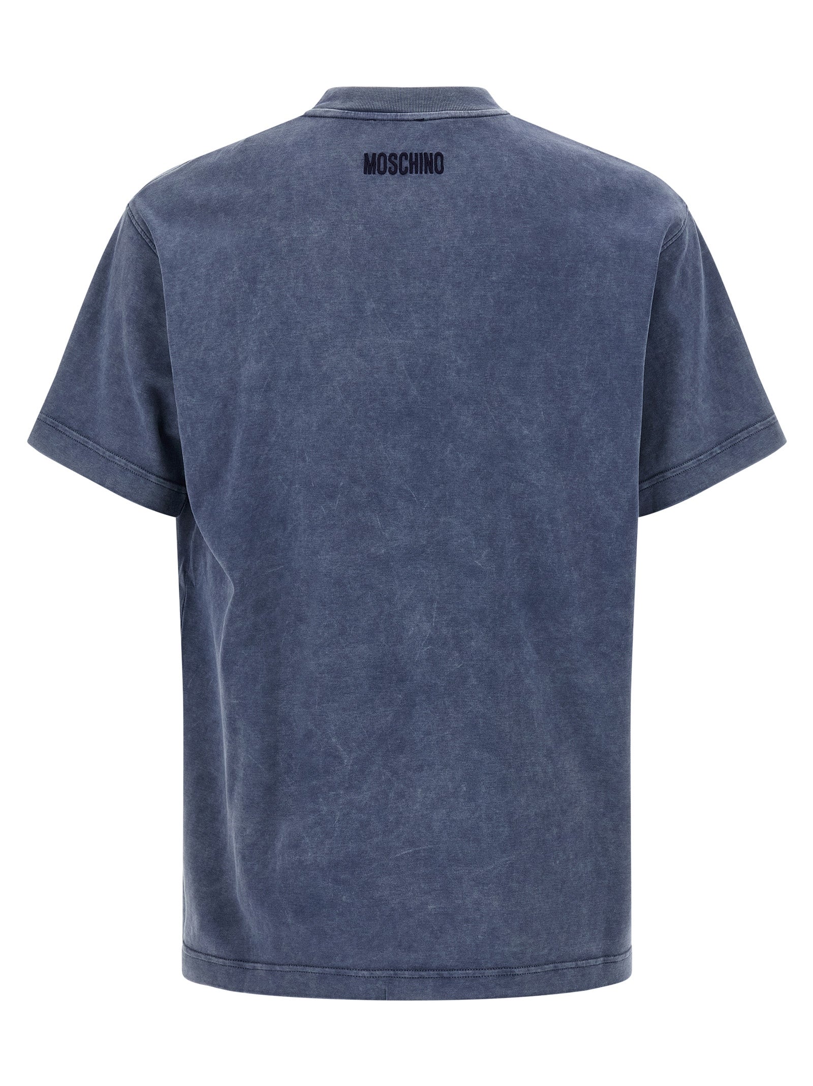 Elevate your style with the Moschino Blue Cotton T-Shirt, a luxurious statement piece crafted from 100% heavy cotton, embodying sophistication and bold elegance.