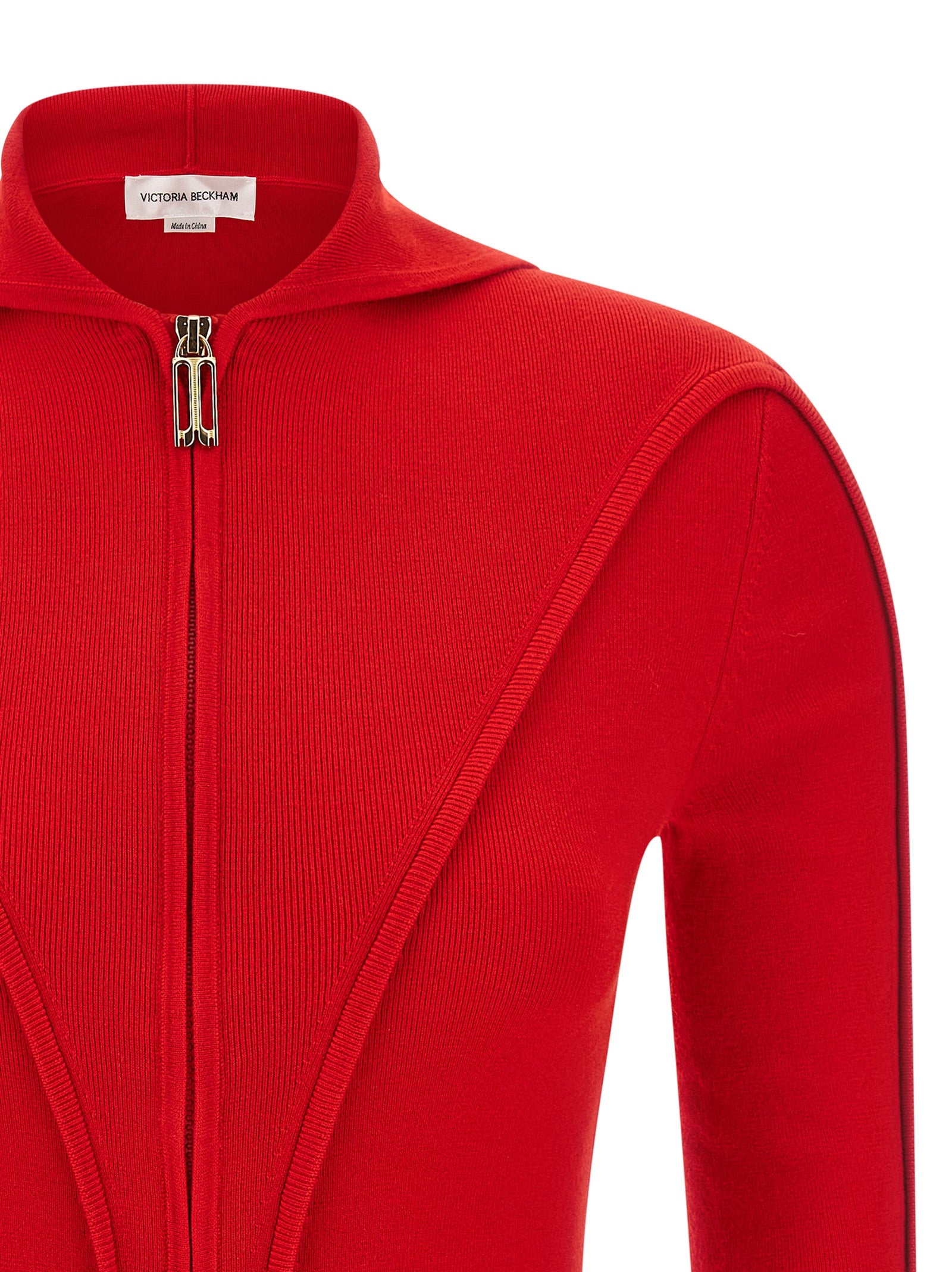 Indulge in the Victoria Beckham Multicolor Wool Cardigan, a luxurious blend of wool and nylon, embodying timeless elegance and sophisticated allure for the discerning individual.