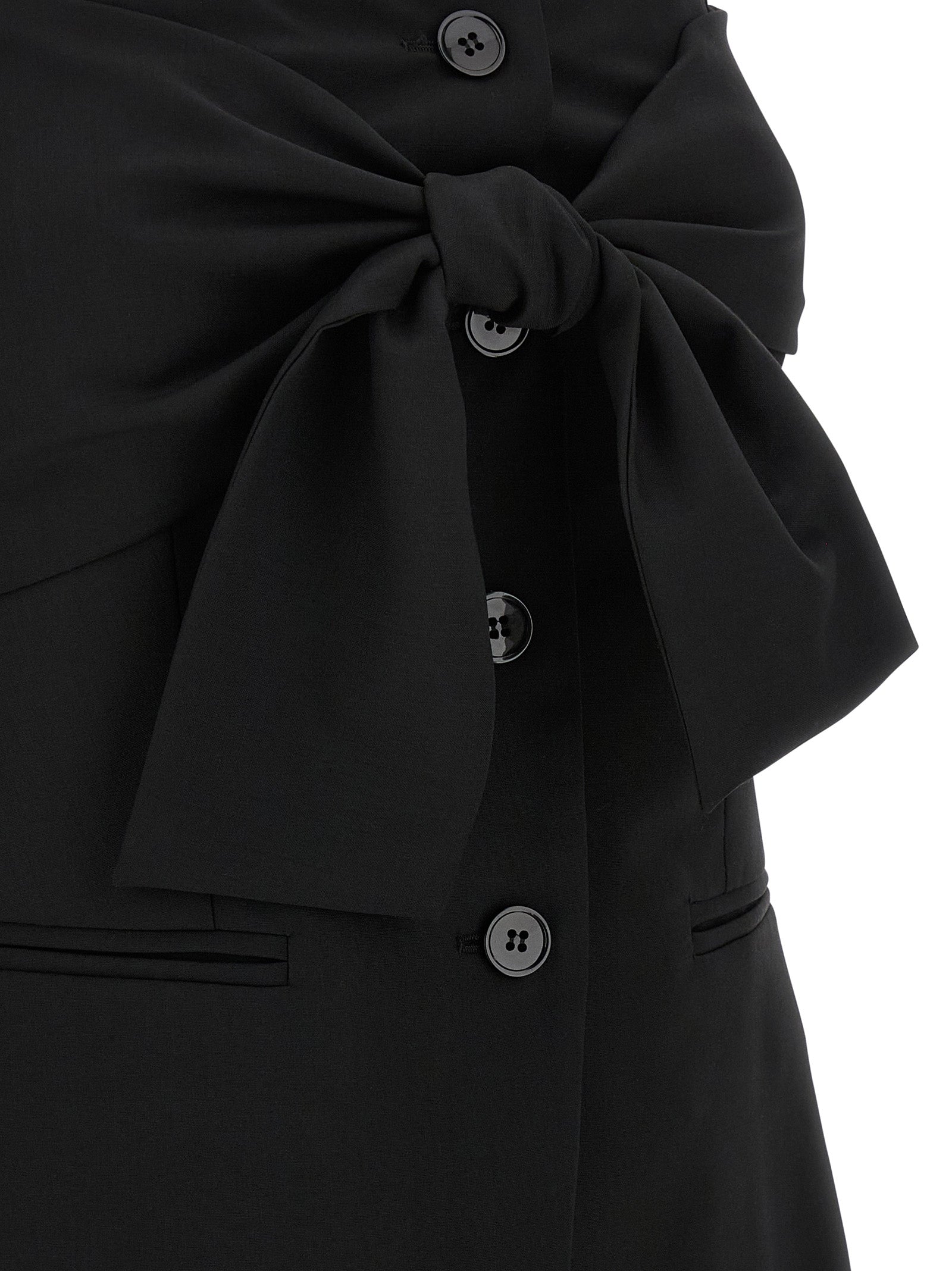 Indulge in the elegance of Max Mara's Black Virgin Wool Off-Shoulder Couture Top, a masterpiece of luxurious craftsmanship that redefines sophistication for every occasion.