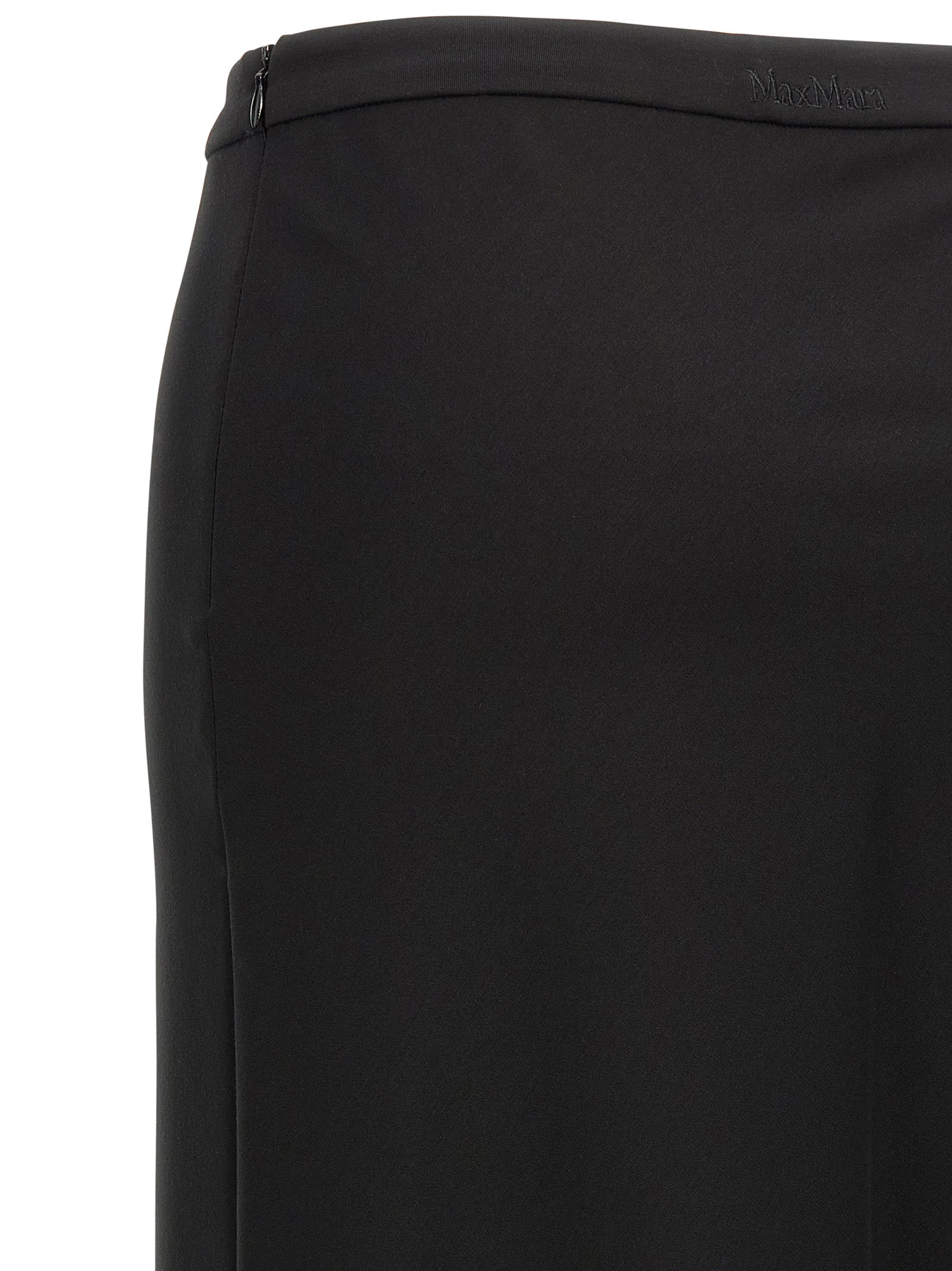 Elevate your wardrobe with Max Mara's Black Viscose Mini Skirt, a luxurious blend of elegance and comfort, perfect for the discerning individual seeking timeless sophistication.