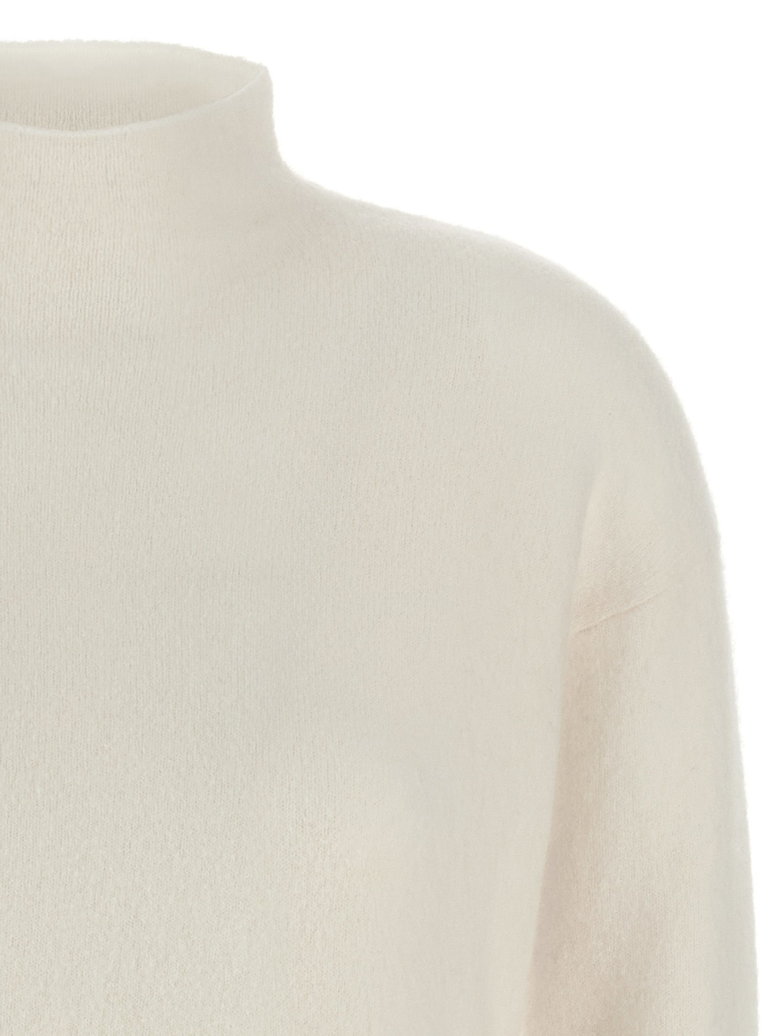 Indulge in the Max Mara White Cashmere Cardigan, a luxurious blend of cashmere and elegance, perfect for elevating your sophisticated style.