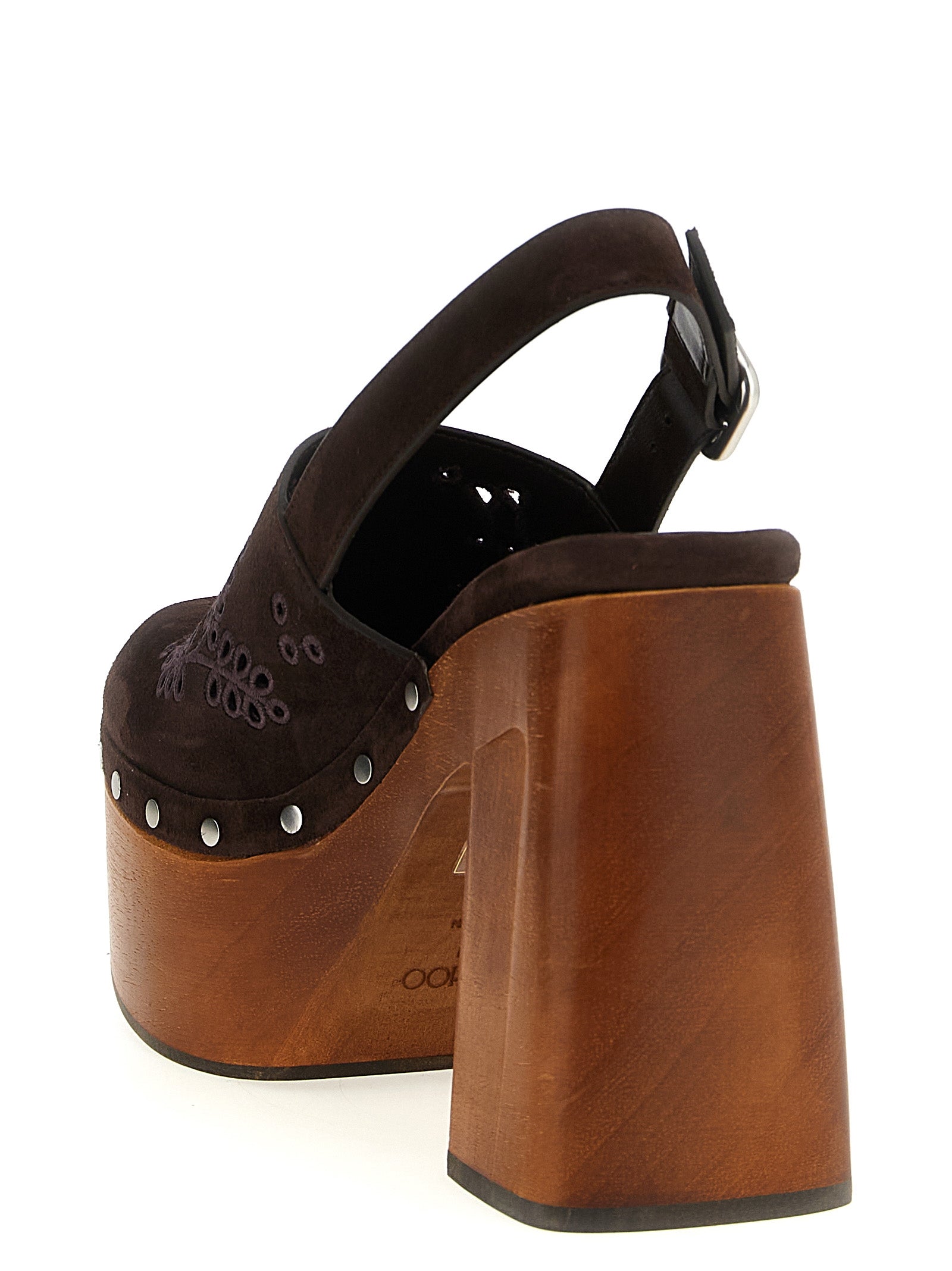 Elevate your elegance with Jimmy Choo's artisanal brown leather high heel pumps, where exquisite craftsmanship meets timeless sophistication for the discerning connoisseur.