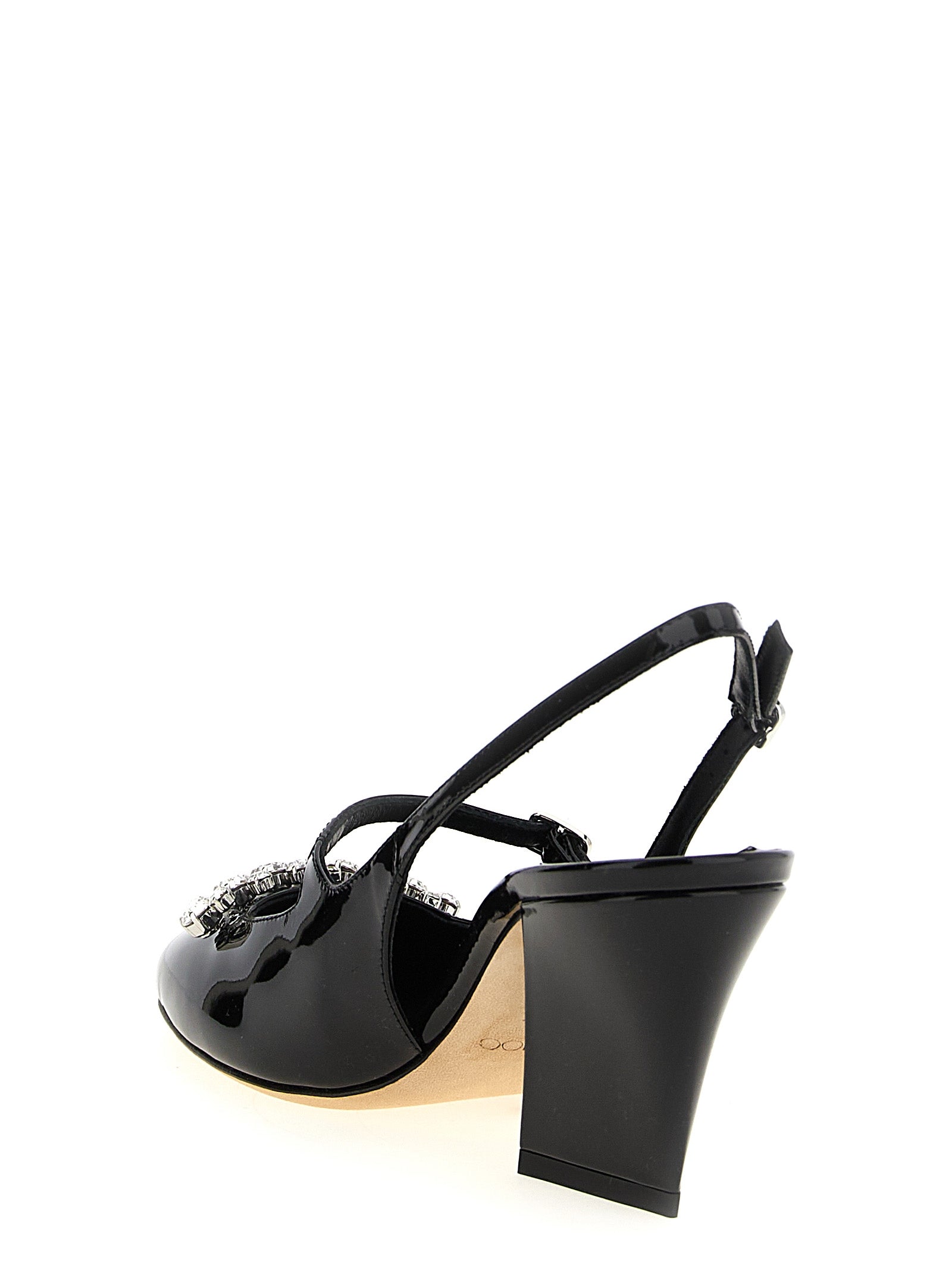 Step into a realm of elegance with Jimmy Choo's Black Leather Mid Heel Pumps, where exquisite patent leather meets artisanal craftsmanship, perfect for the discerning aficionado.