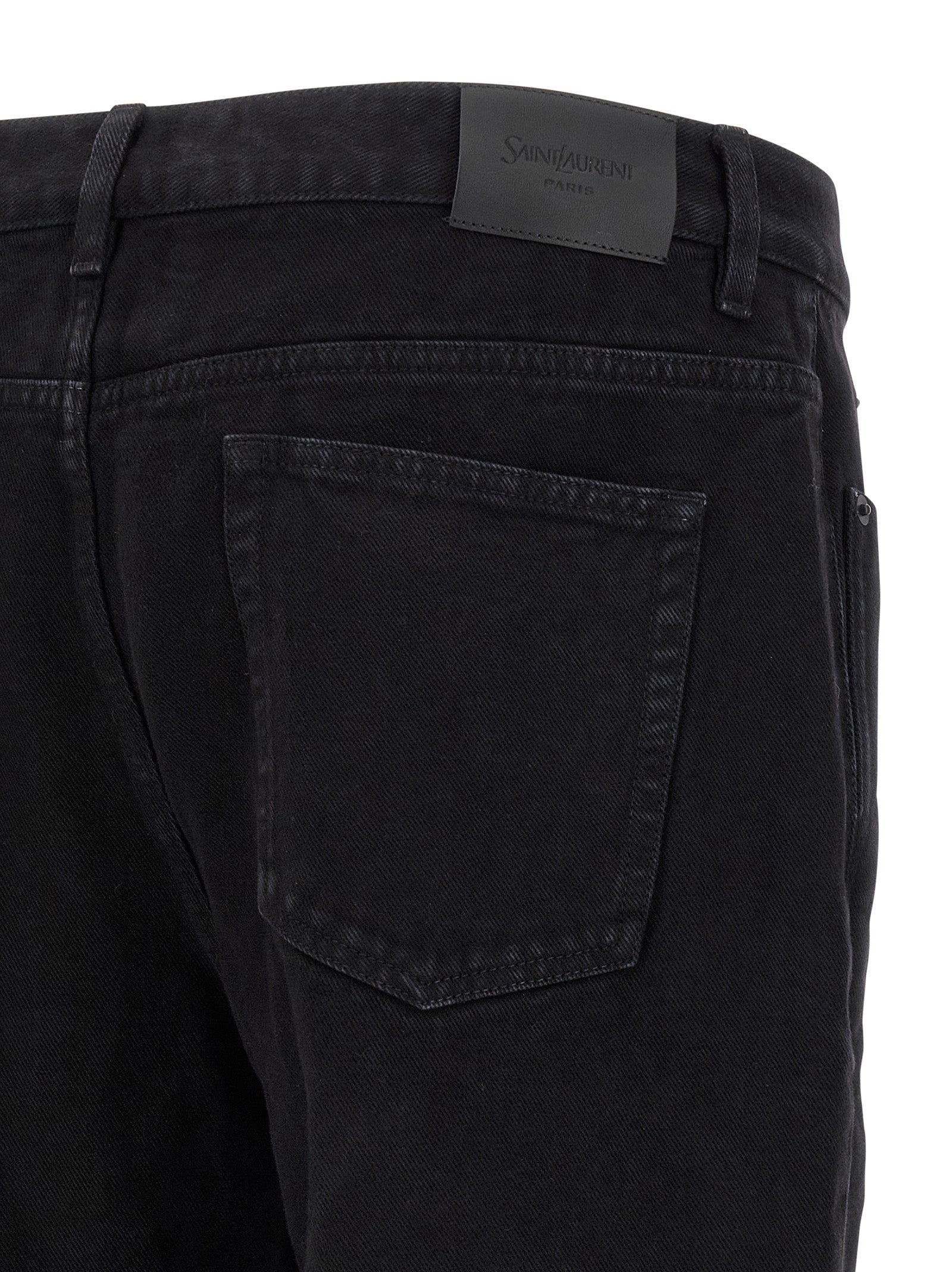 Experience the allure of Saint Laurent's Black Cotton Straight-Leg Jeans, where Italian craftsmanship meets timeless elegance, perfect for the discerning fashion connoisseur.