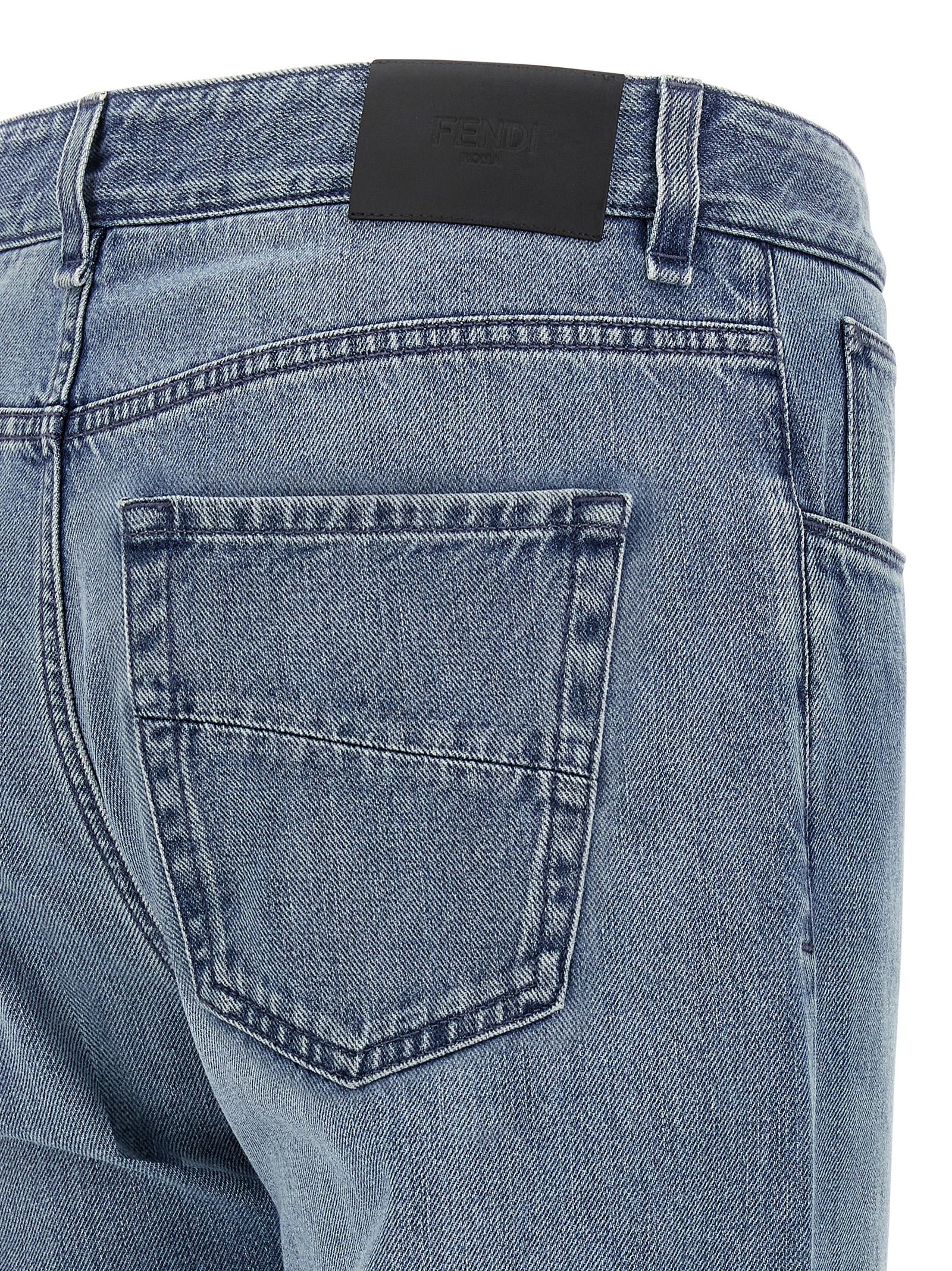 Elevate your style with Fendi's light blue cotton straight-leg jeans, a masterpiece of Italian craftsmanship that embodies timeless elegance and modern sophistication.
