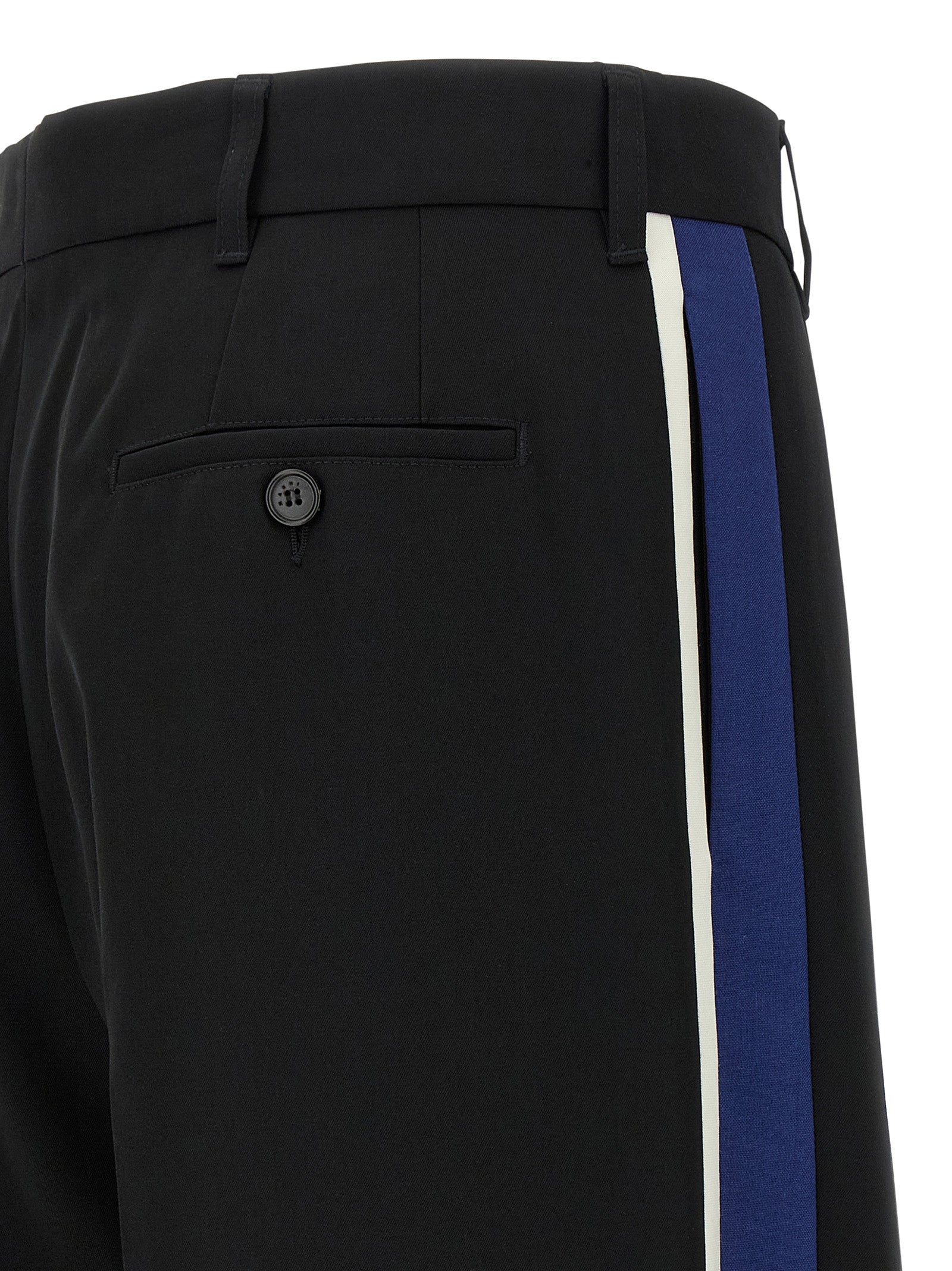 Experience the epitome of elegance with Marni Black Virgin Wool Dress Pants, crafted from luxurious virgin wool, merging timeless sophistication with modern allure.