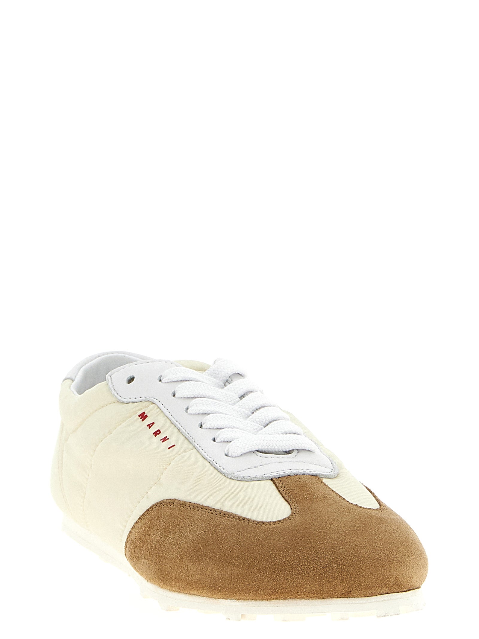Experience the allure of Marni's Softy Soccer Sneakers, crafted from luxurious polyamide, blending vibrant elegance with Italian craftsmanship for a statement in every step.