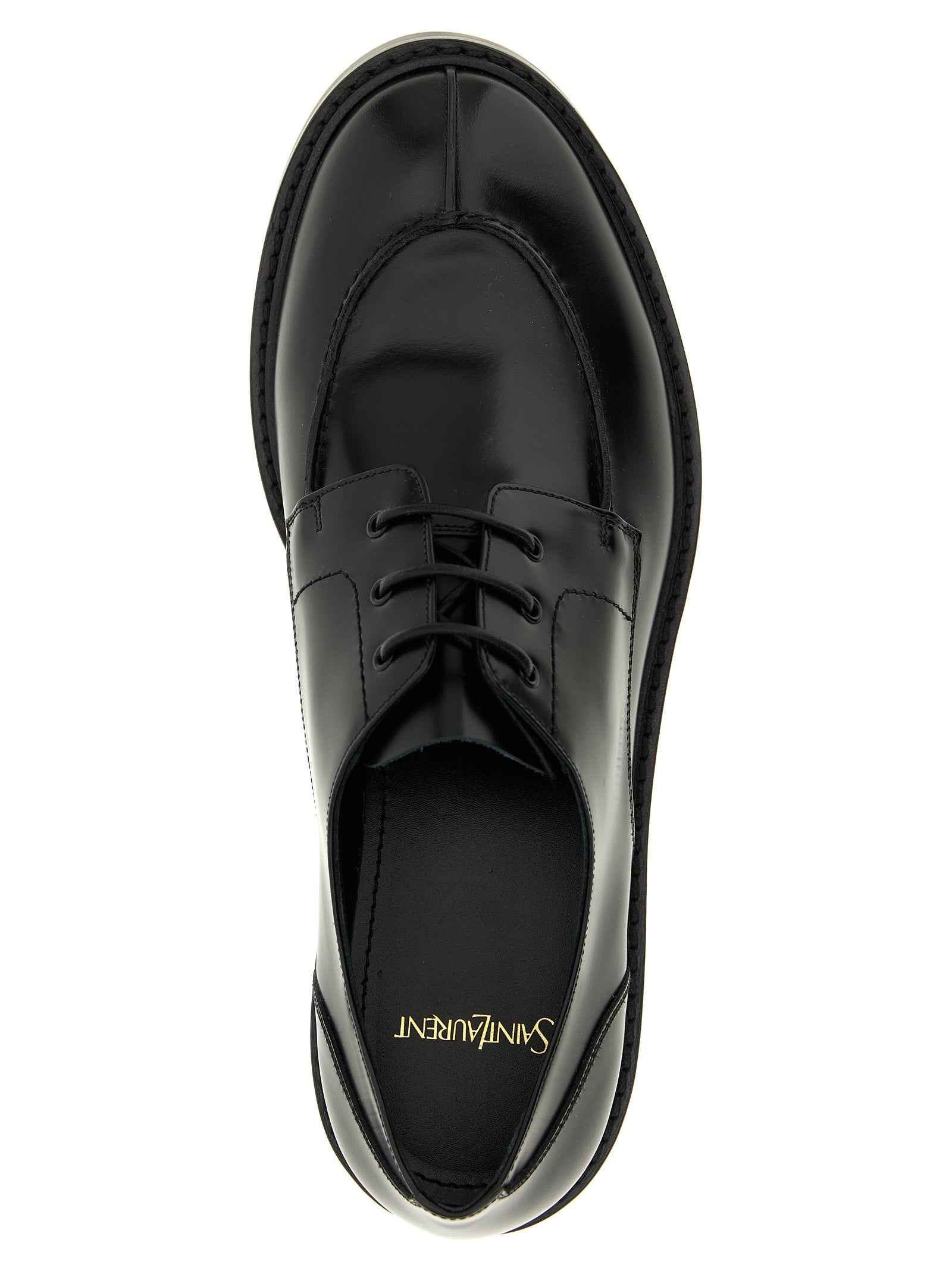 Discover the allure of Saint Laurent Black Calfskin Oxfords, where exquisite craftsmanship meets timeless elegance, perfect for the discerning individual seeking sophistication.