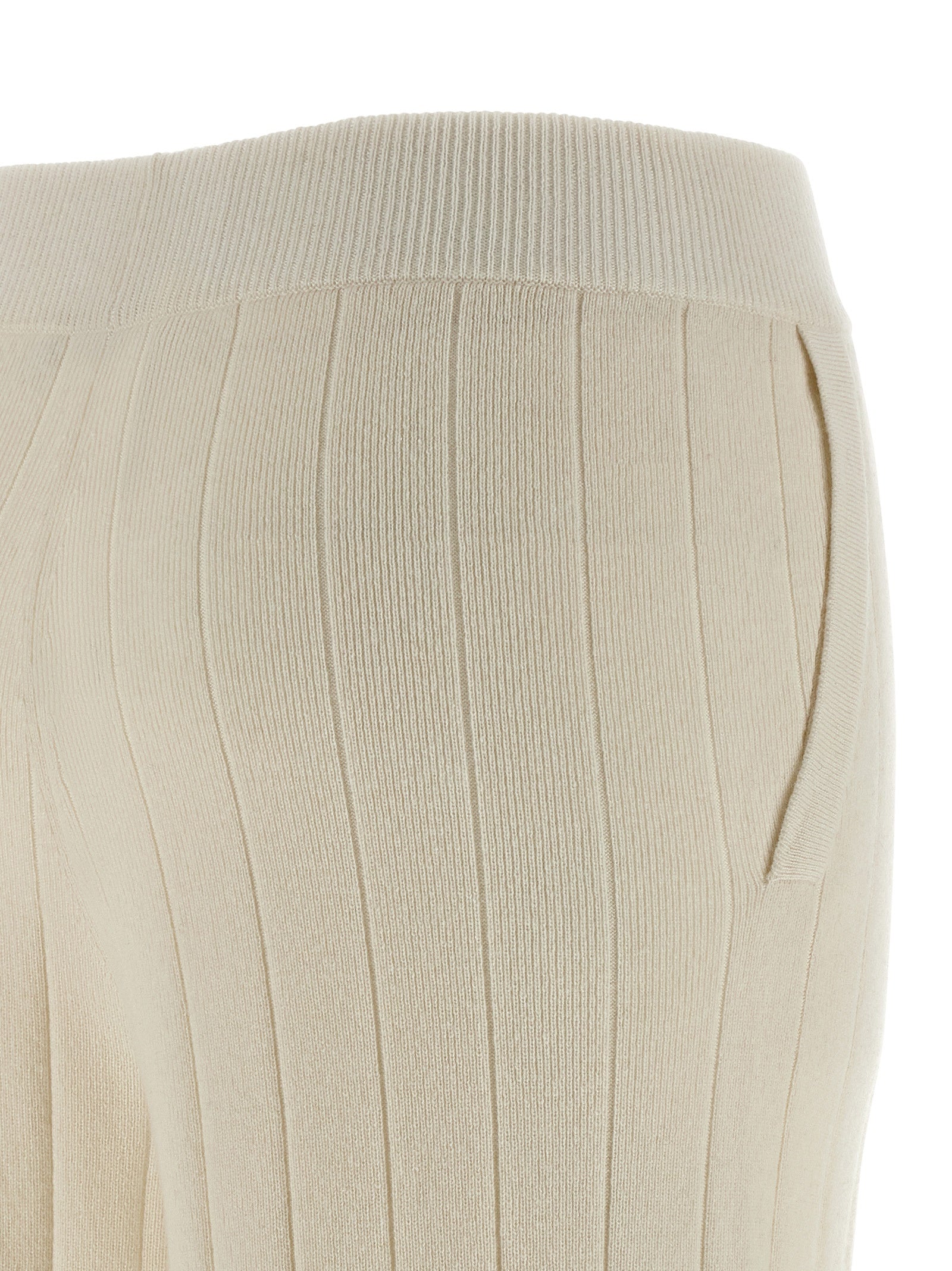 Elevate your loungewear with Max Mara's White Cashmere Joggers, where sumptuous cashmere meets chic design for effortless sophistication and timeless elegance.