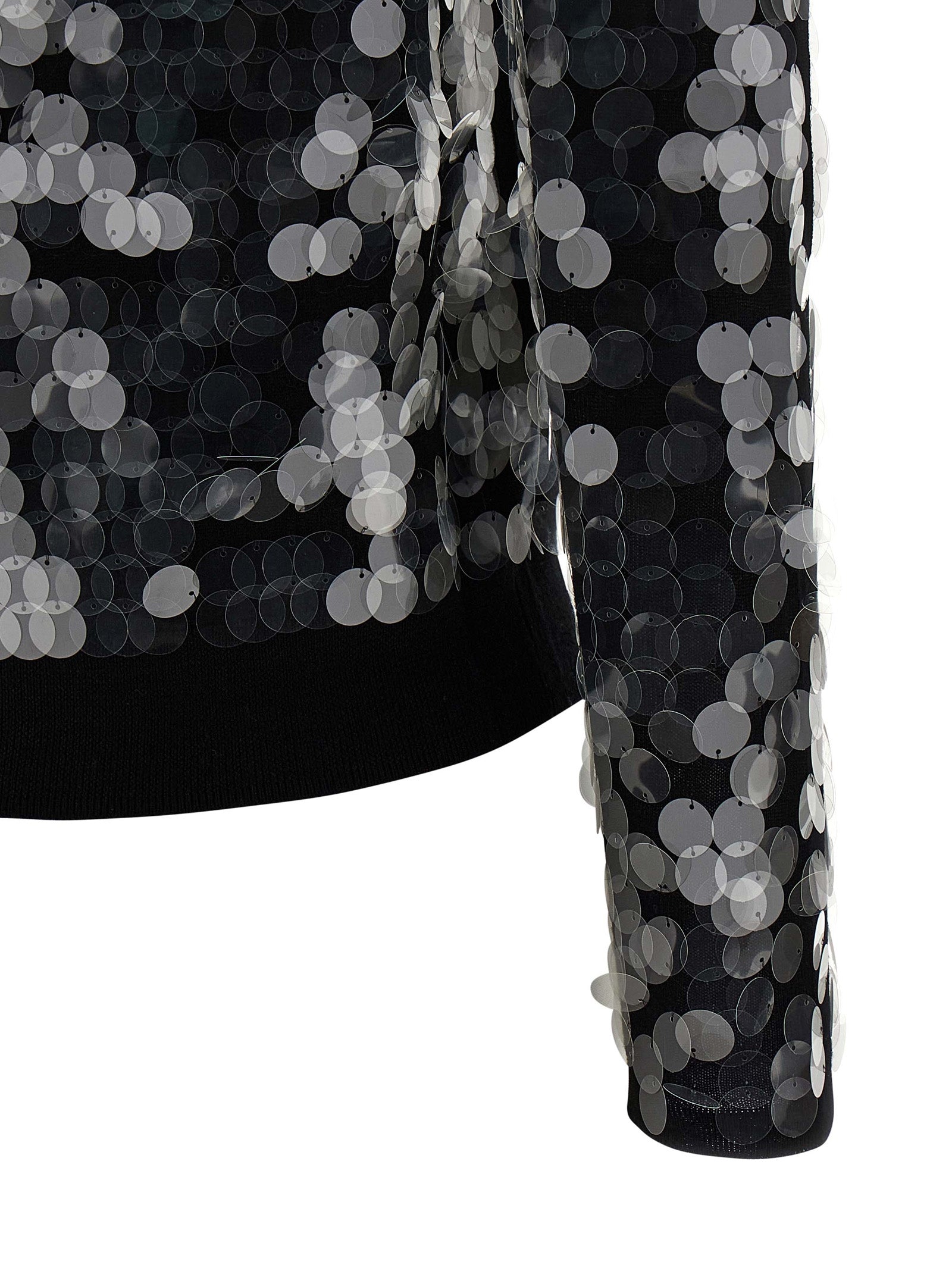 Indulge in the Max Mara Black Virgin Wool Cardigan, a timeless piece of artisanal elegance, adorned with macro sequins for an exquisite touch of luxury.