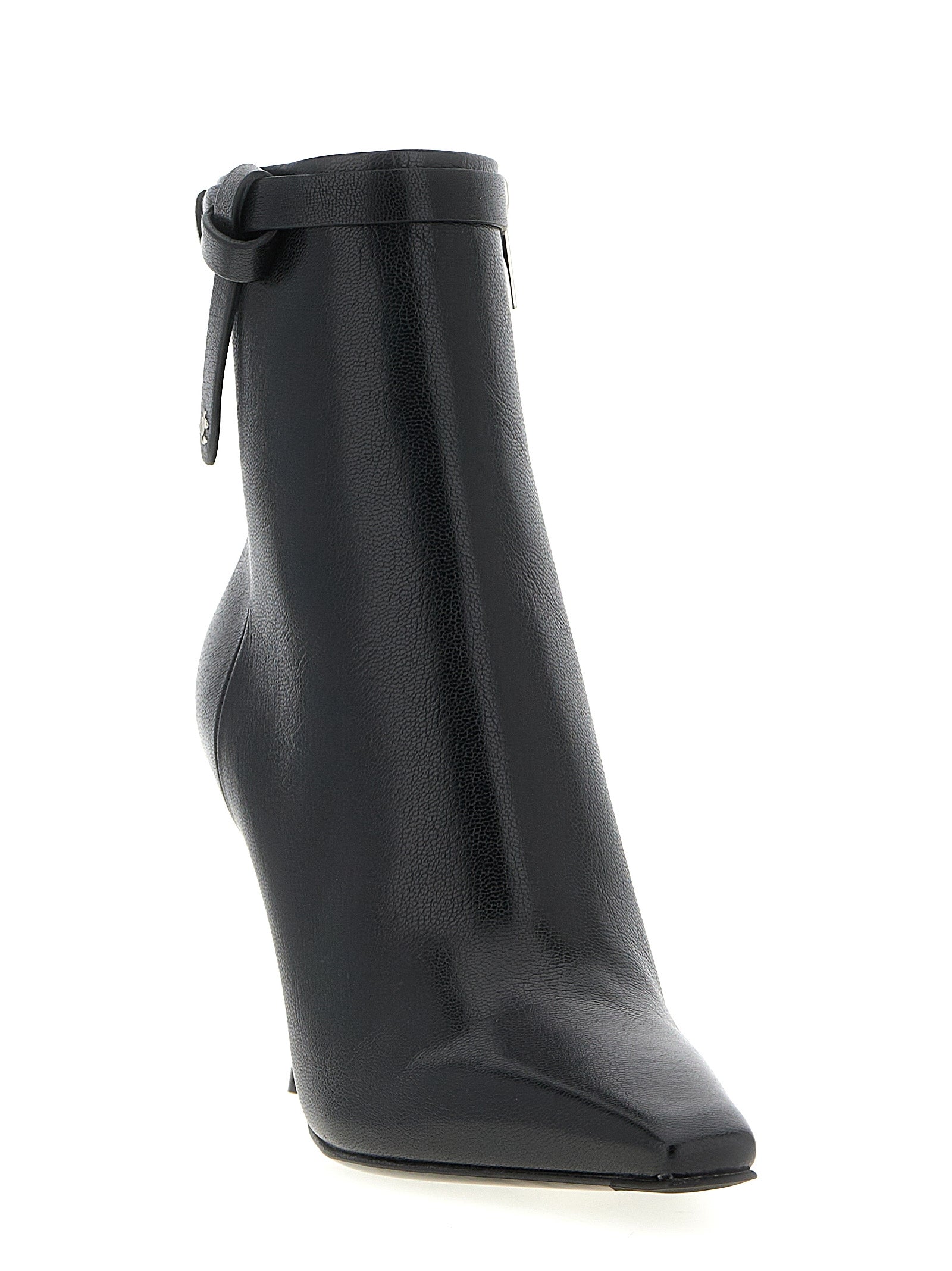 Step into a world of elegance with Jimmy Choo's 'Camie' ankle boots, crafted from luxurious kidskin leather, embodying exquisite artistry and timeless allure.