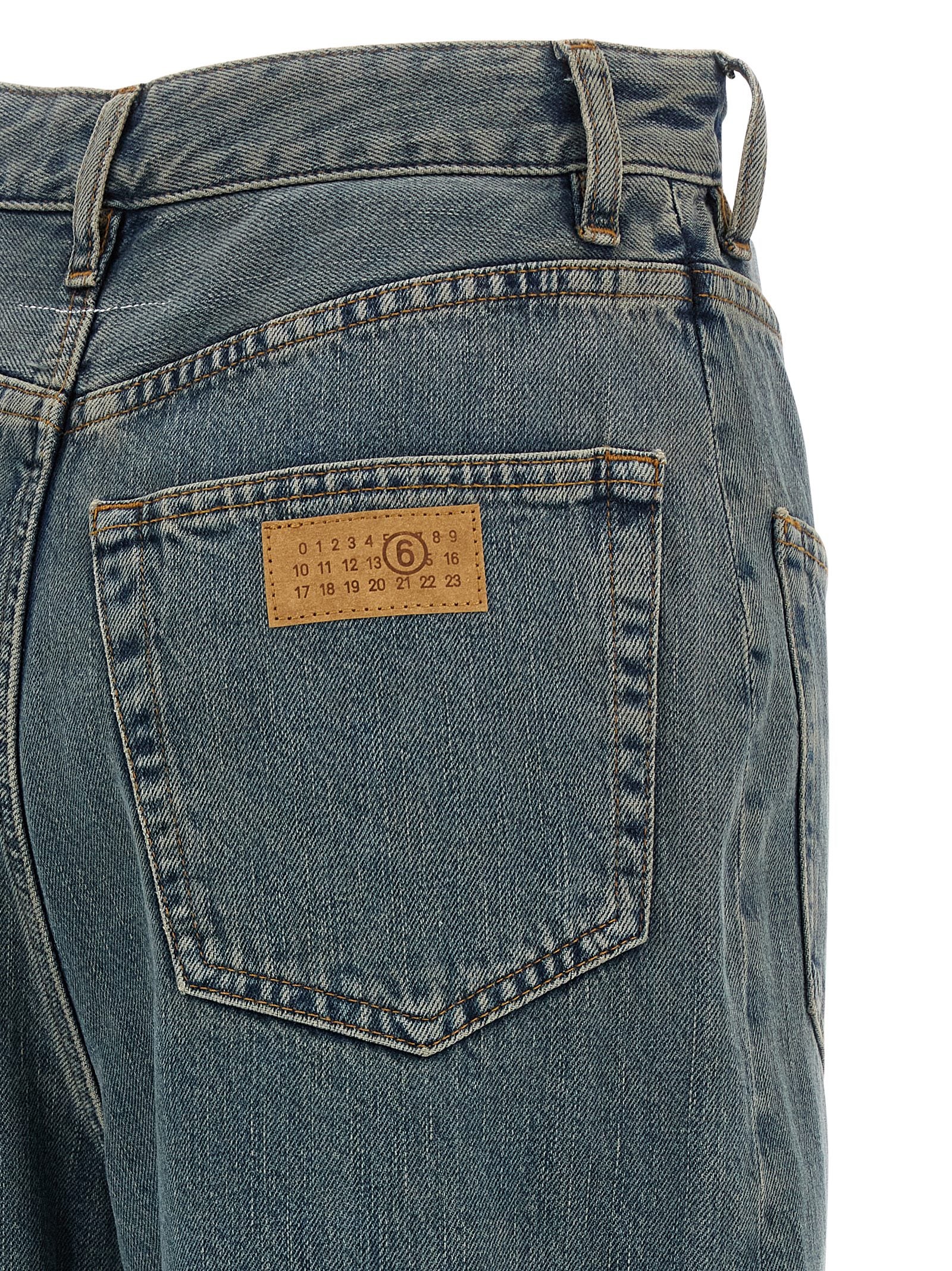 Discover the artistry of MM6 Maison Margiela's Blue Cotton Jeans Denim, where innovative design meets luxurious craftsmanship for a statement of contemporary elegance.