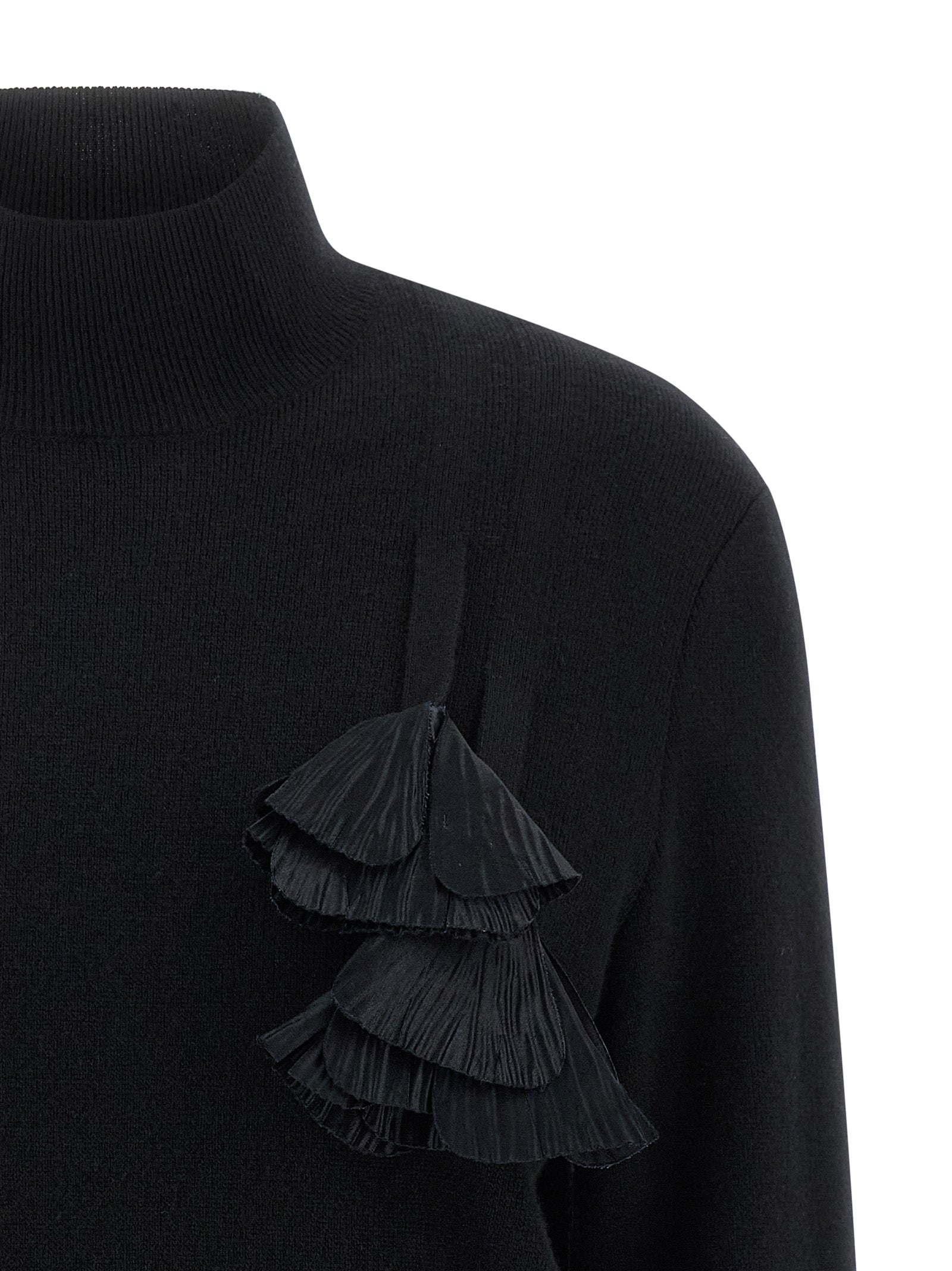 Indulge in the Ferragamo Black Virgin Wool Cardigan, a masterpiece of luxurious craftsmanship, blending virgin wool and cashmere for timeless elegance.