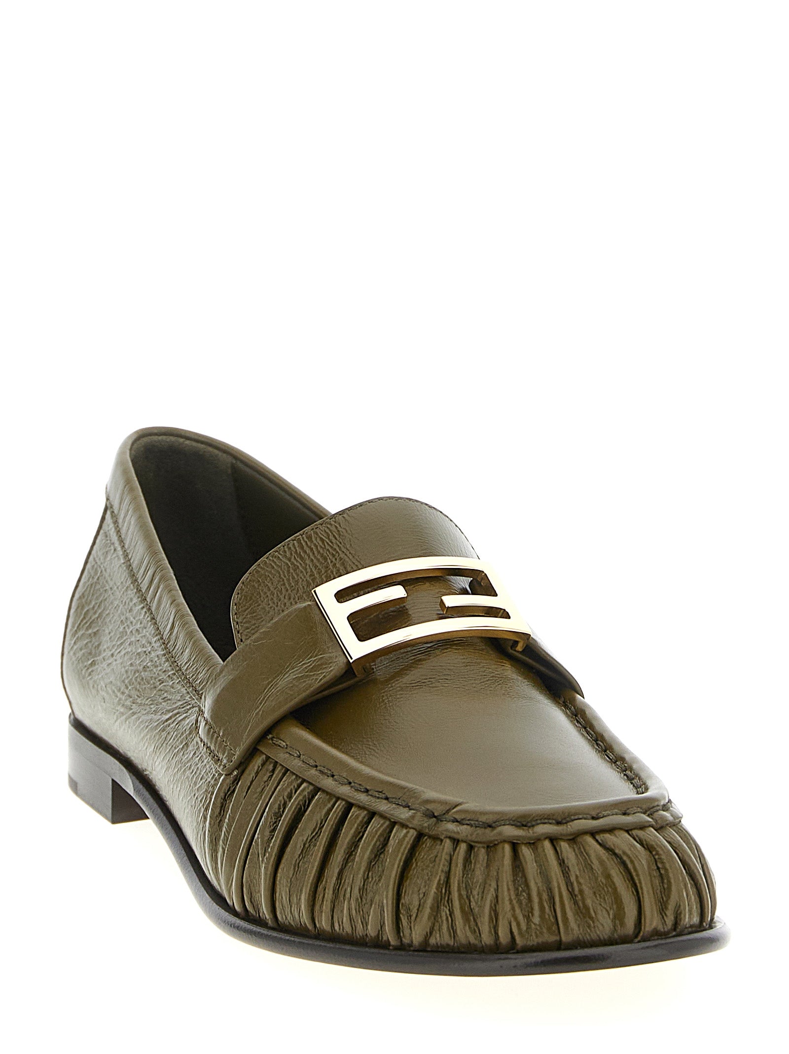 Indulge in the exquisite Fendi Bicolor Lamb Leather Slip-On Loafers, where artisanal elegance meets bold luxury, perfect for the discerning connoisseur.
