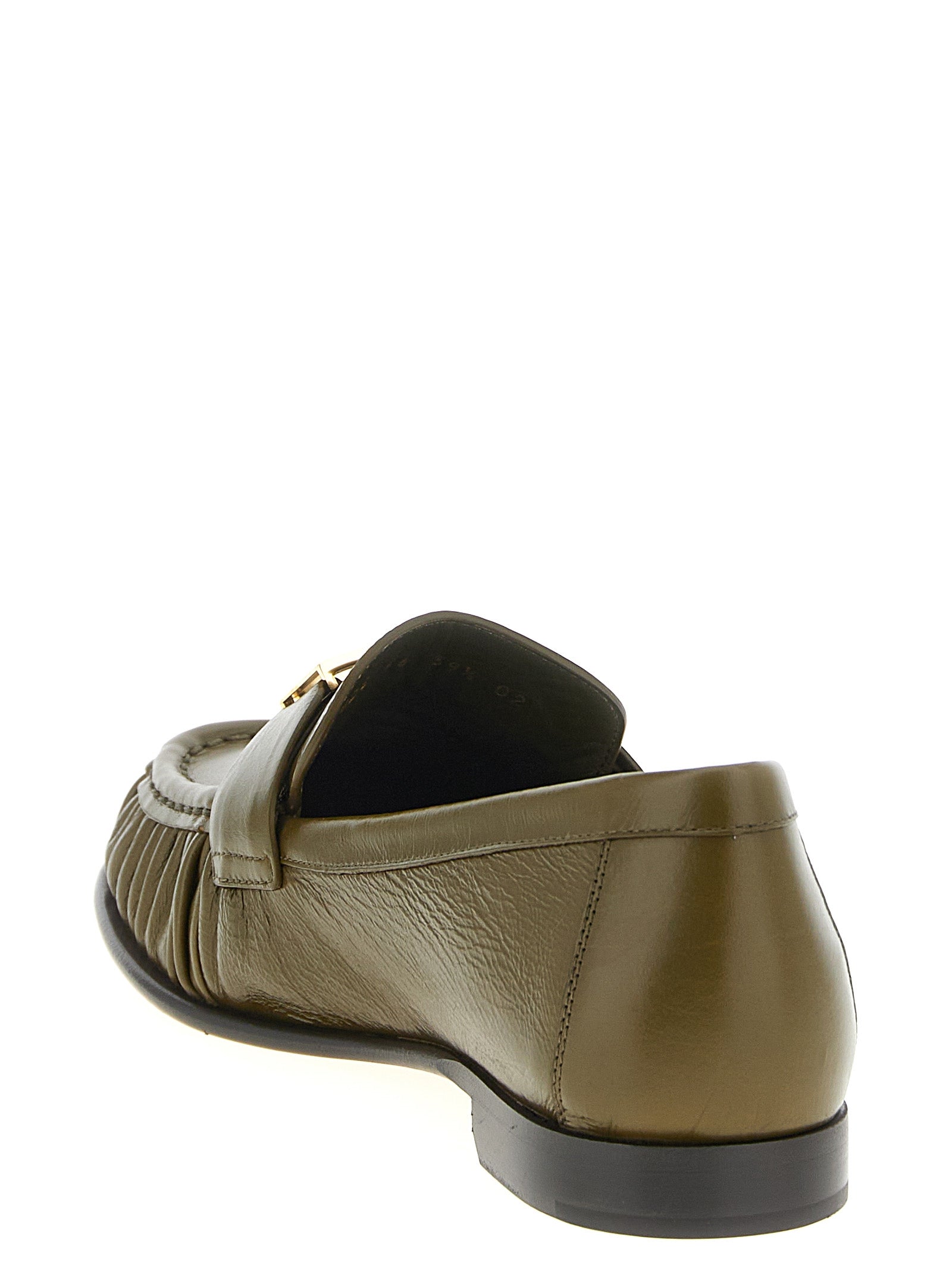 Discover the Fendi Bicolor Lamb Leather Slip-On Loafers, where exquisite craftsmanship meets bold luxury, perfect for those who embody elegance and sophistication.