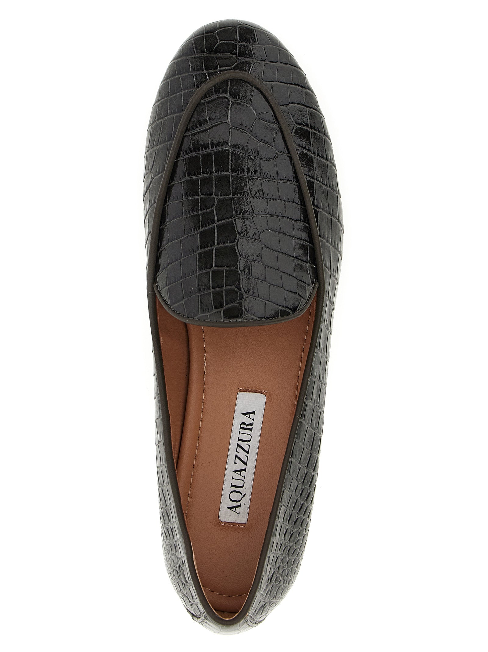 Indulge in the exquisite artistry of Aquazzura's Black Calfskin Slip-On Loafers, where luxurious materials and Italian craftsmanship elevate your style to unparalleled sophistication.