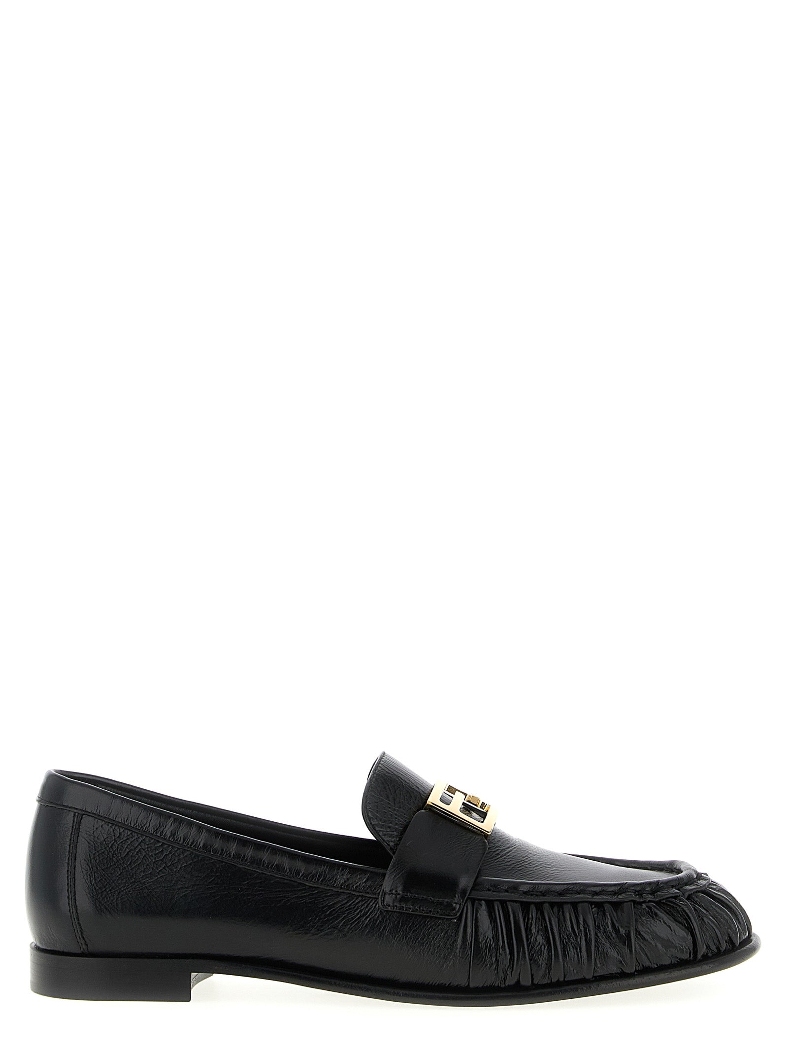 Elevate your style with Fendi's Black Lamb Leather Slip-On Loafers, a masterpiece of Italian craftsmanship that embodies timeless luxury and effortless elegance.