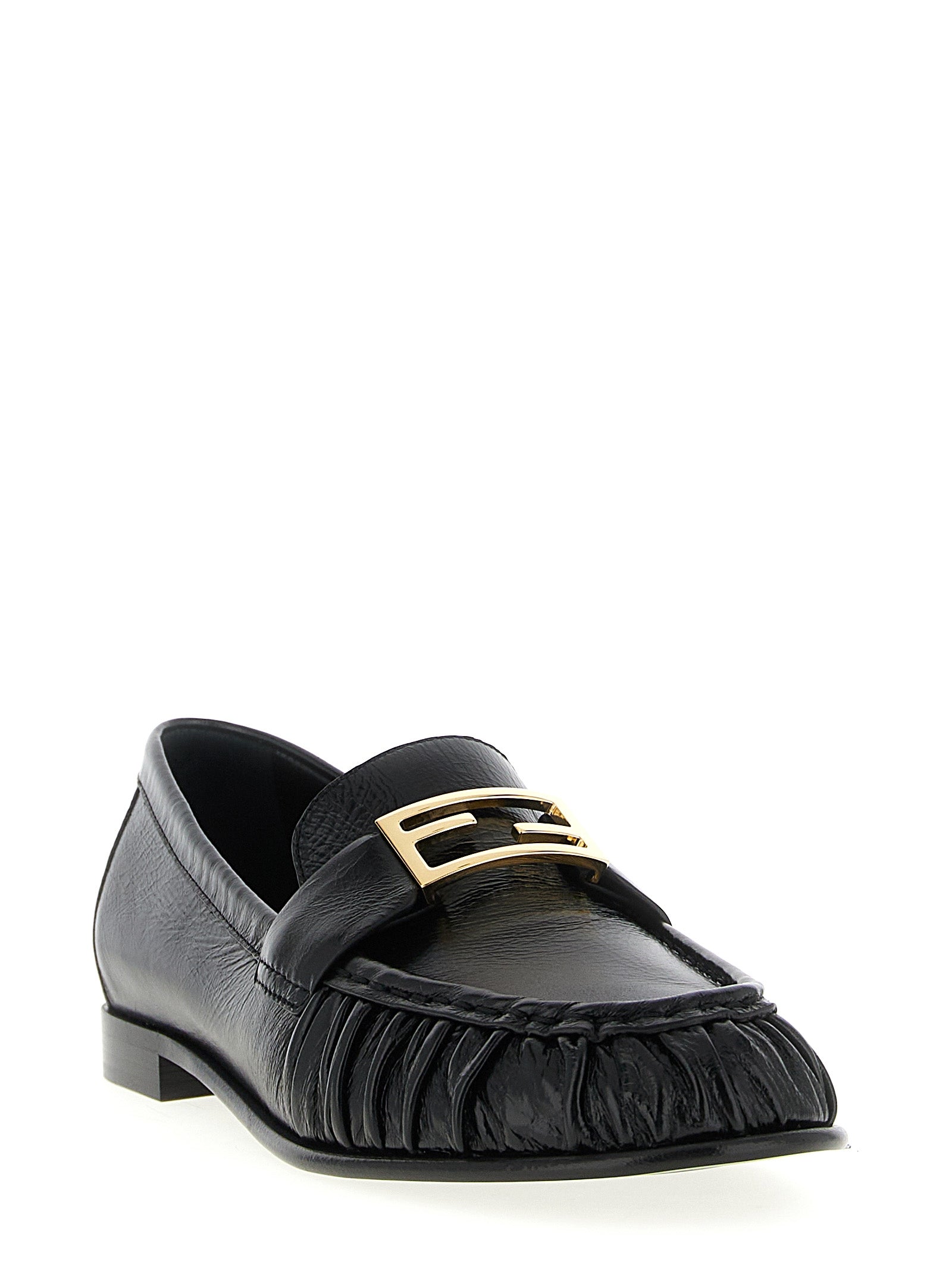 Elevate your style with Fendi Black Lamb Leather Slip-On Loafers, where artisanal craftsmanship meets timeless luxury, perfect for any sophisticated occasion.