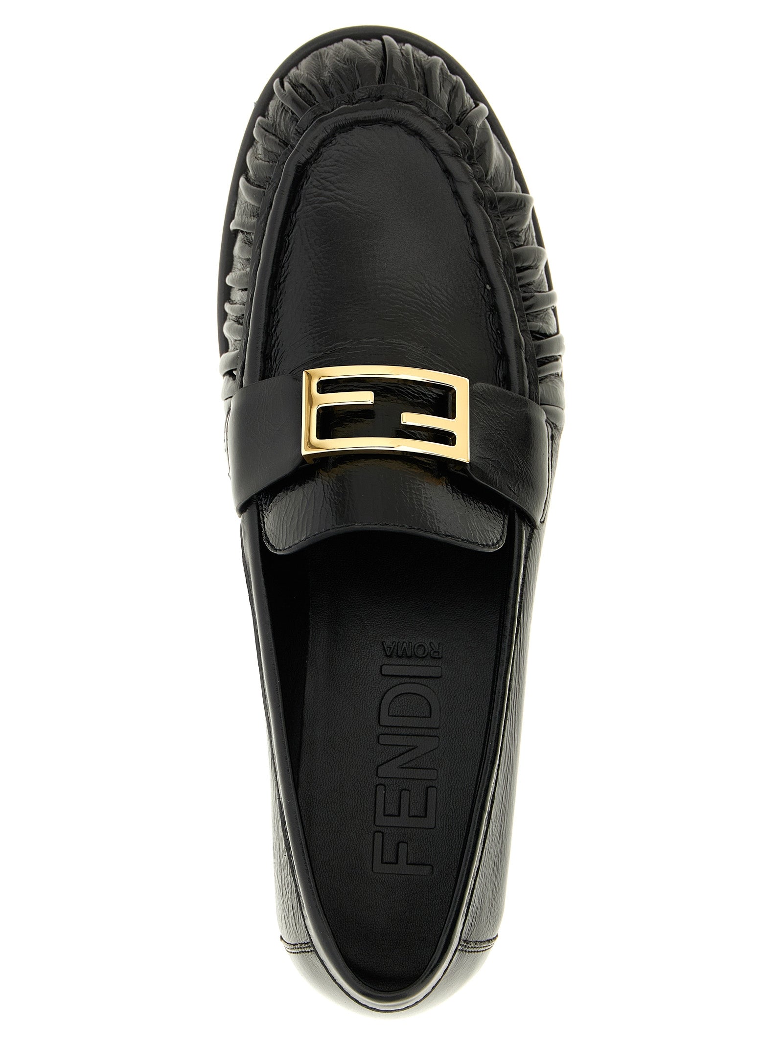 Indulge in the exquisite Fendi Black Lamb Leather Slip-On Loafers, where artisanal craftsmanship meets timeless elegance for the discerning connoisseur.